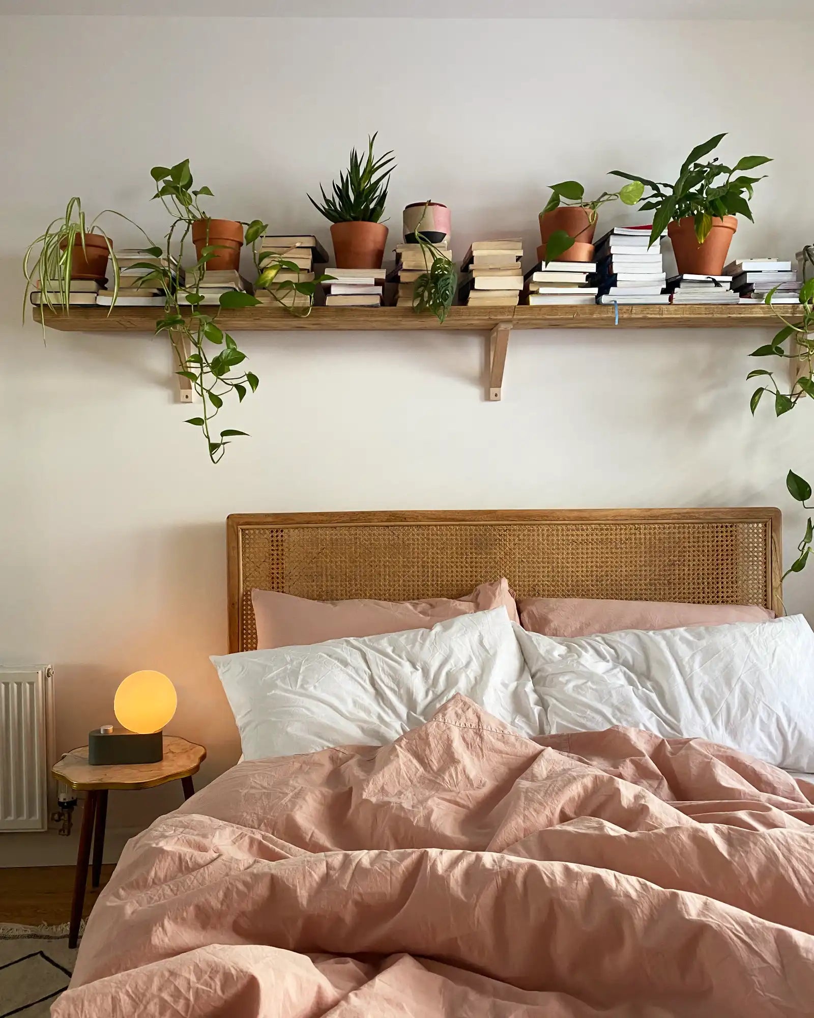 Alumina Table Lamp by Tala featured within a scandinavian bedroom | Nook Collections