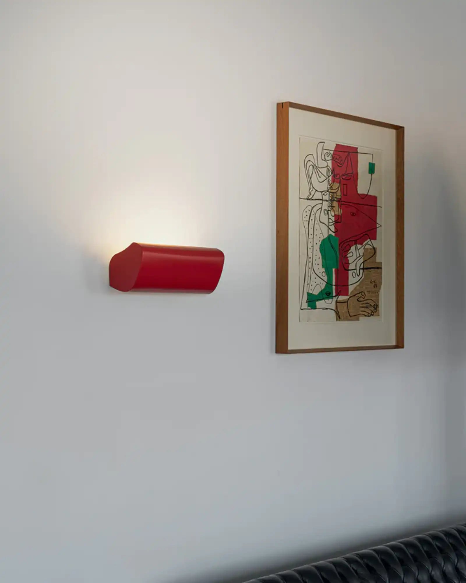 Applique Radieuse Wall Light by Nemo Lighting featured within a contemporary living room | Nook Collections