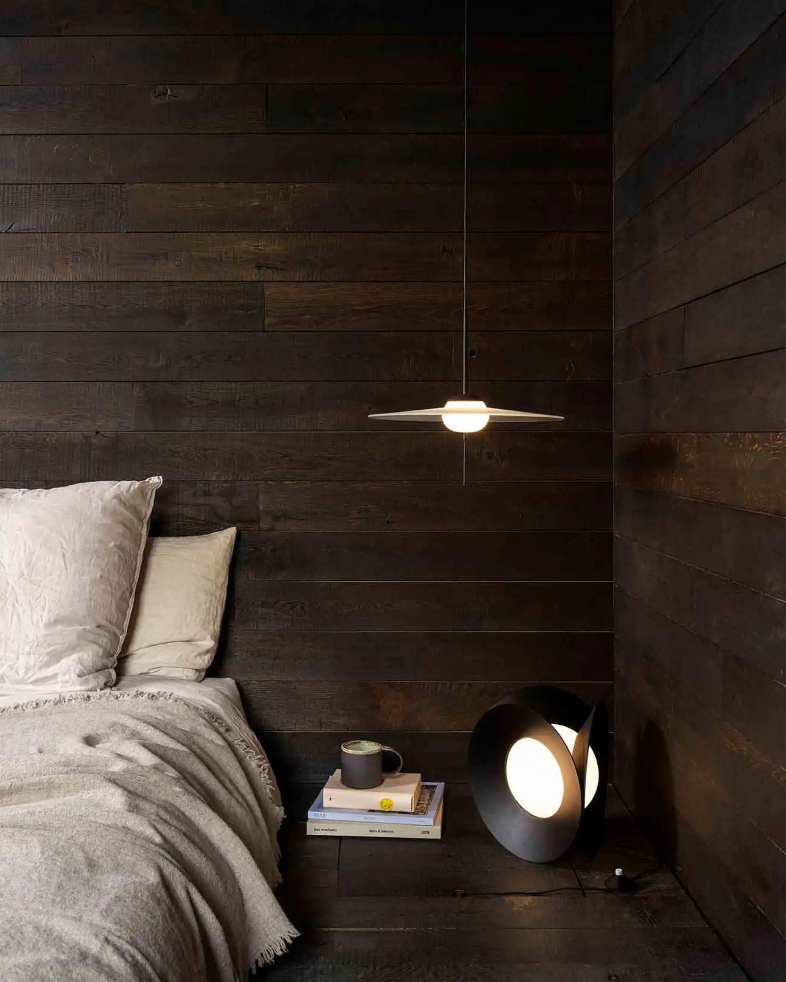 Armen Table Lamp by DCW Editions featured within a contemporary bedroom | Nook Collections