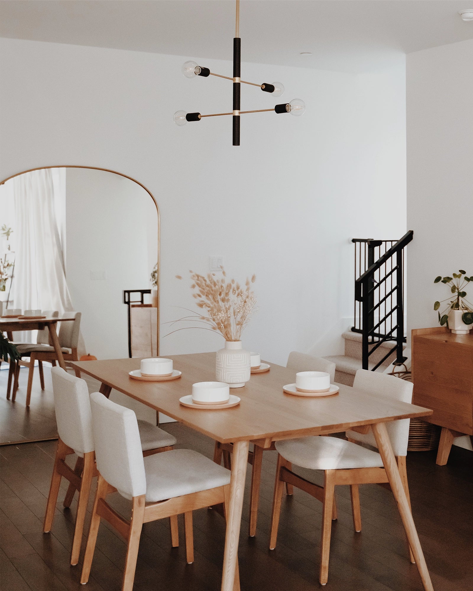 Astrid 4lt Pendant Light by Hudson Valley displayed within a dining room | Nook Collections