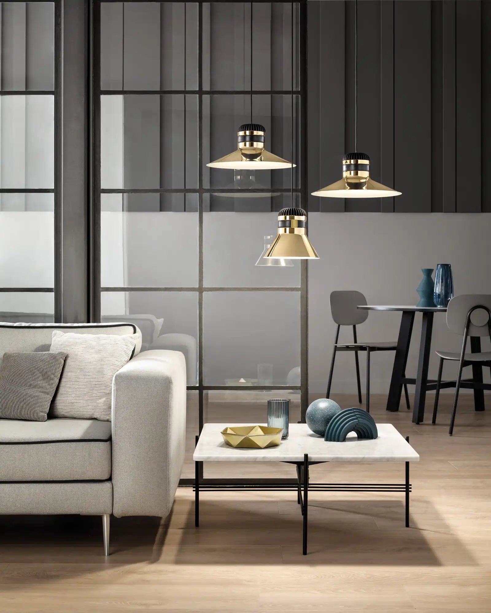 Cordea Pendant Light by Masiero Lighting featured within a modern living room | Nook Collections