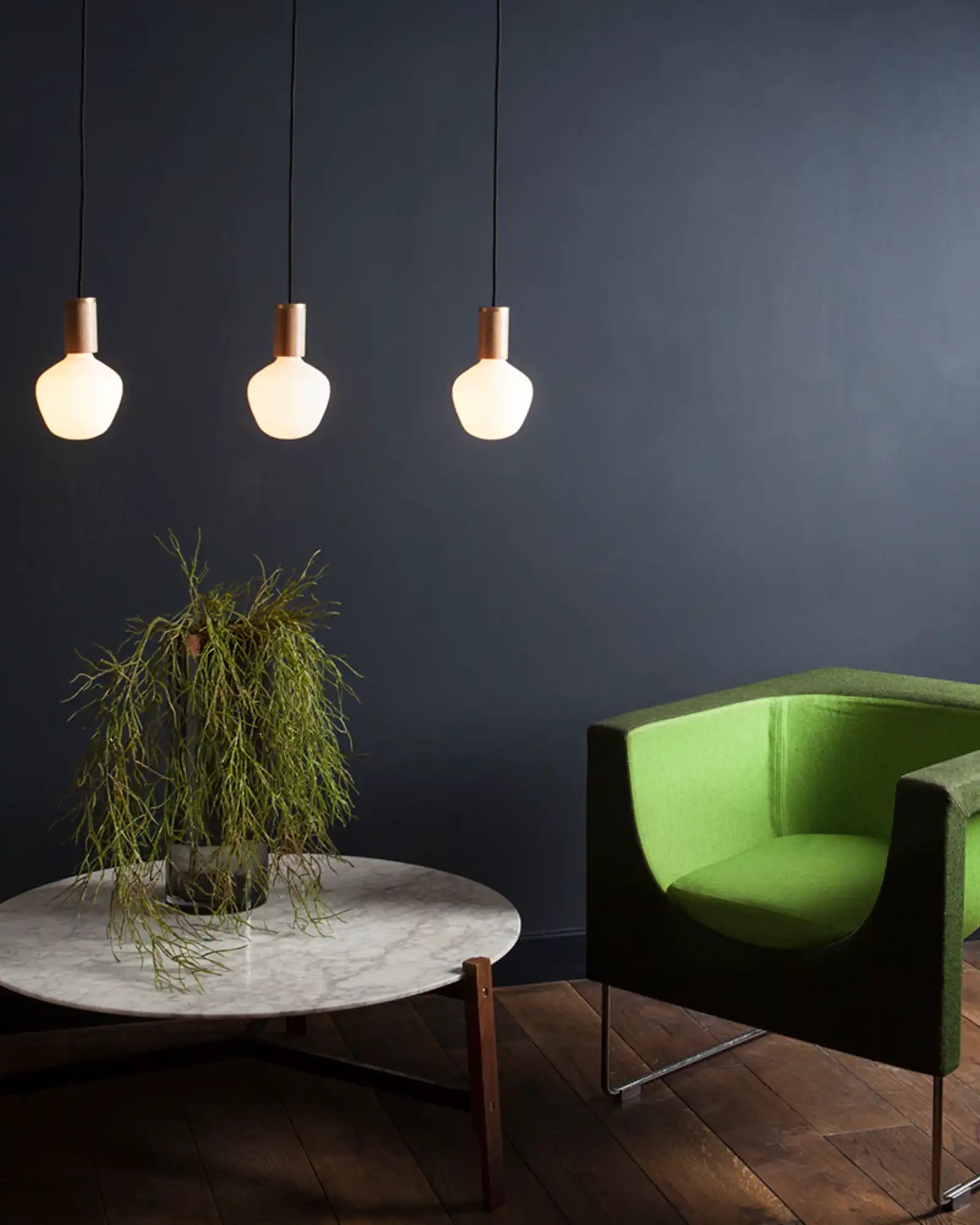 Enno Pendant Light by Tala featured within a contemporary living room | Nook Collections