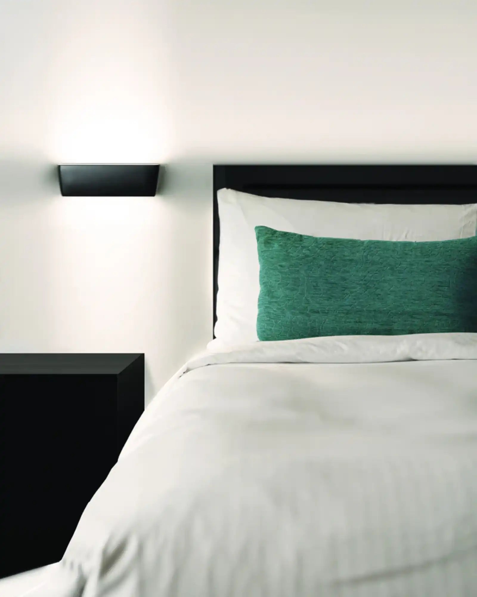 Flaca Wall Light by Nemo Lighting featured within a contemporary bedroom | Nook Collections