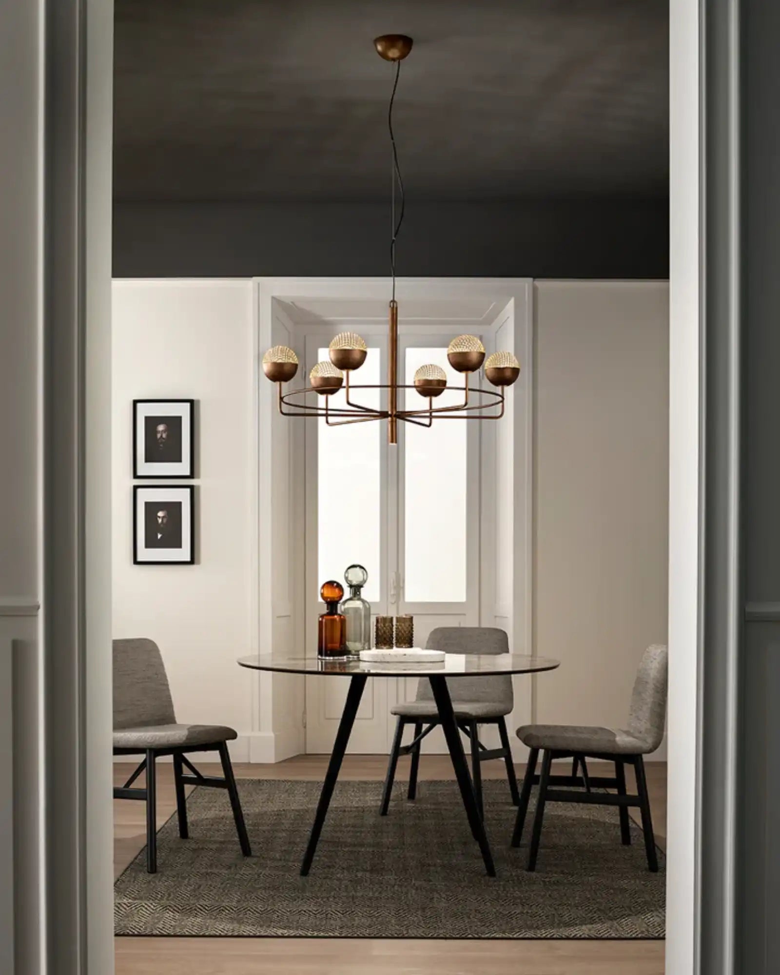 Iglu Chandelier by Masiero Lighting featured within a contemporary dining area | Nook Collections