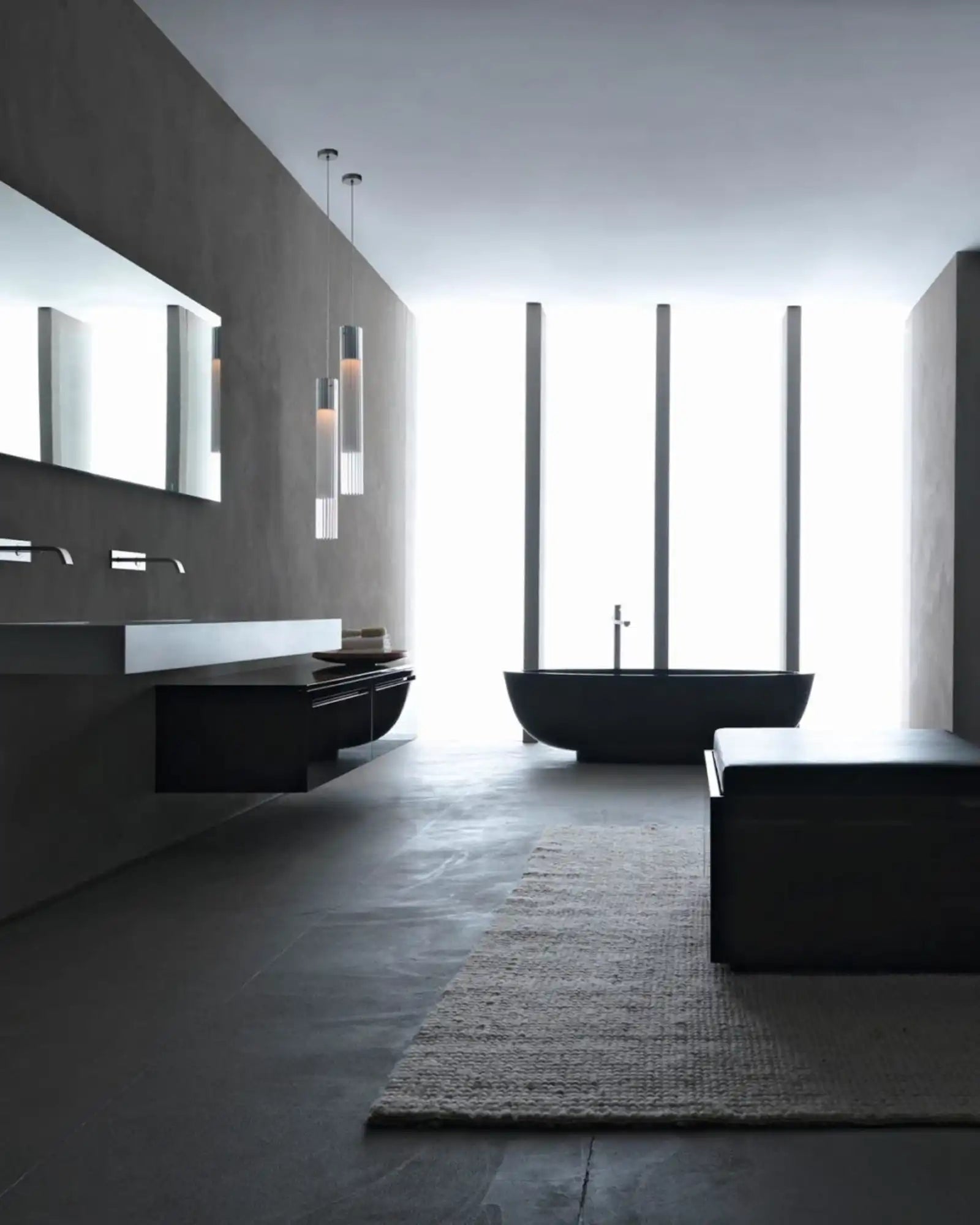Ilium Pendant Light by Nemo Lighting featured within a modern bathroom | Nook Collections