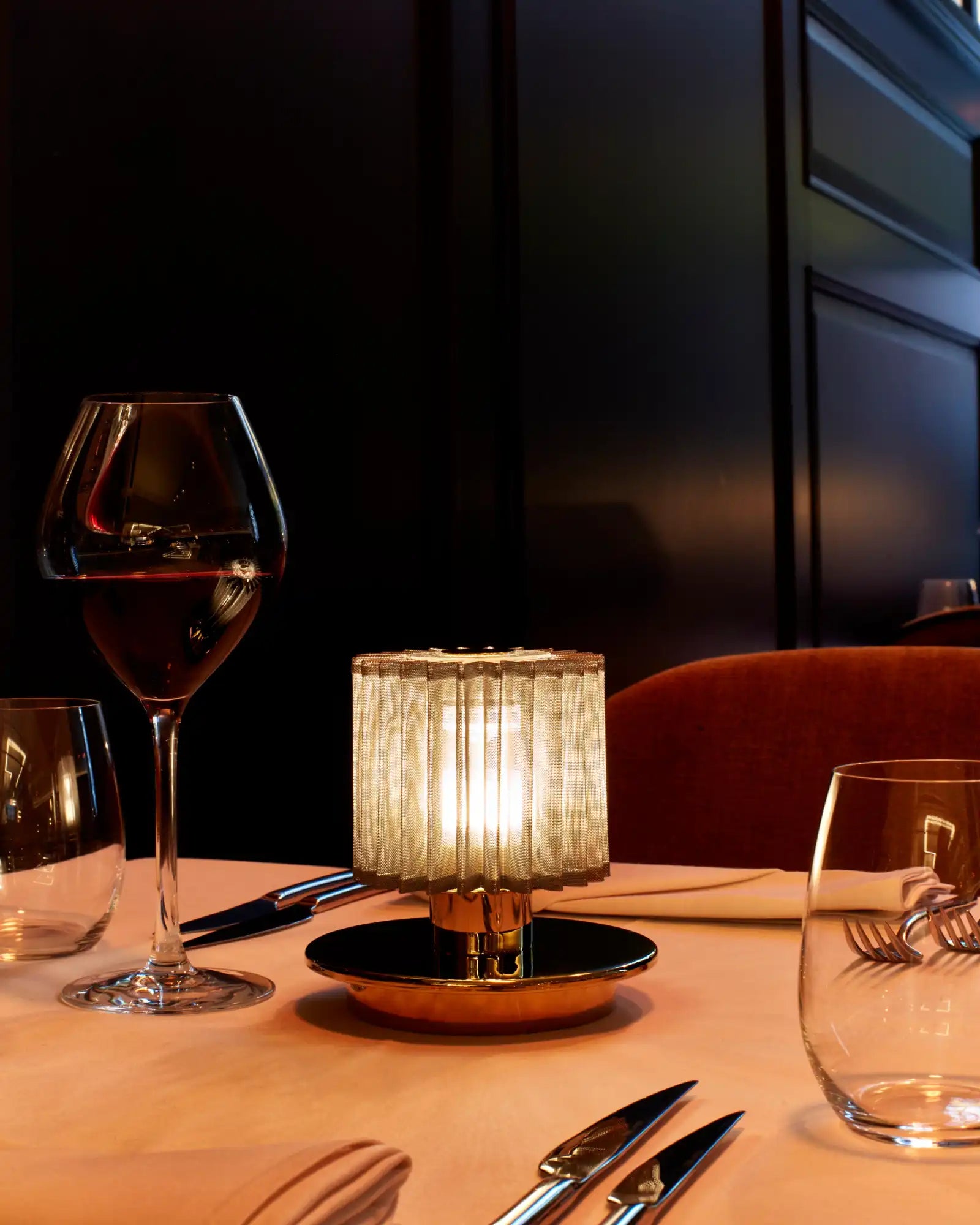 In the Sun Table Lamp by DCW Editions featured within a modern restaurant | Nook Collections