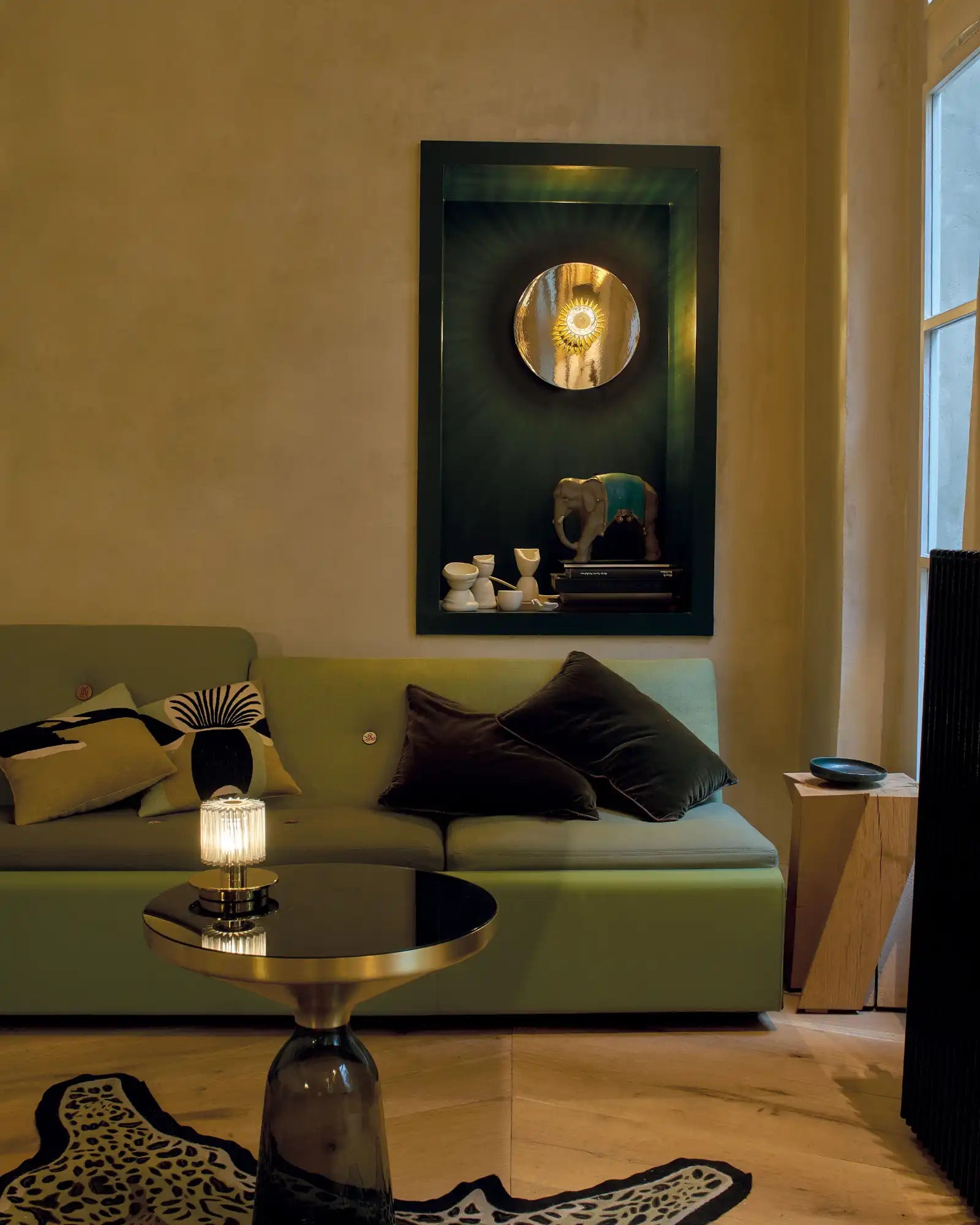 In the Sun Table Lamp by DCW Editions featured within a contemporary living room | Nook Collections