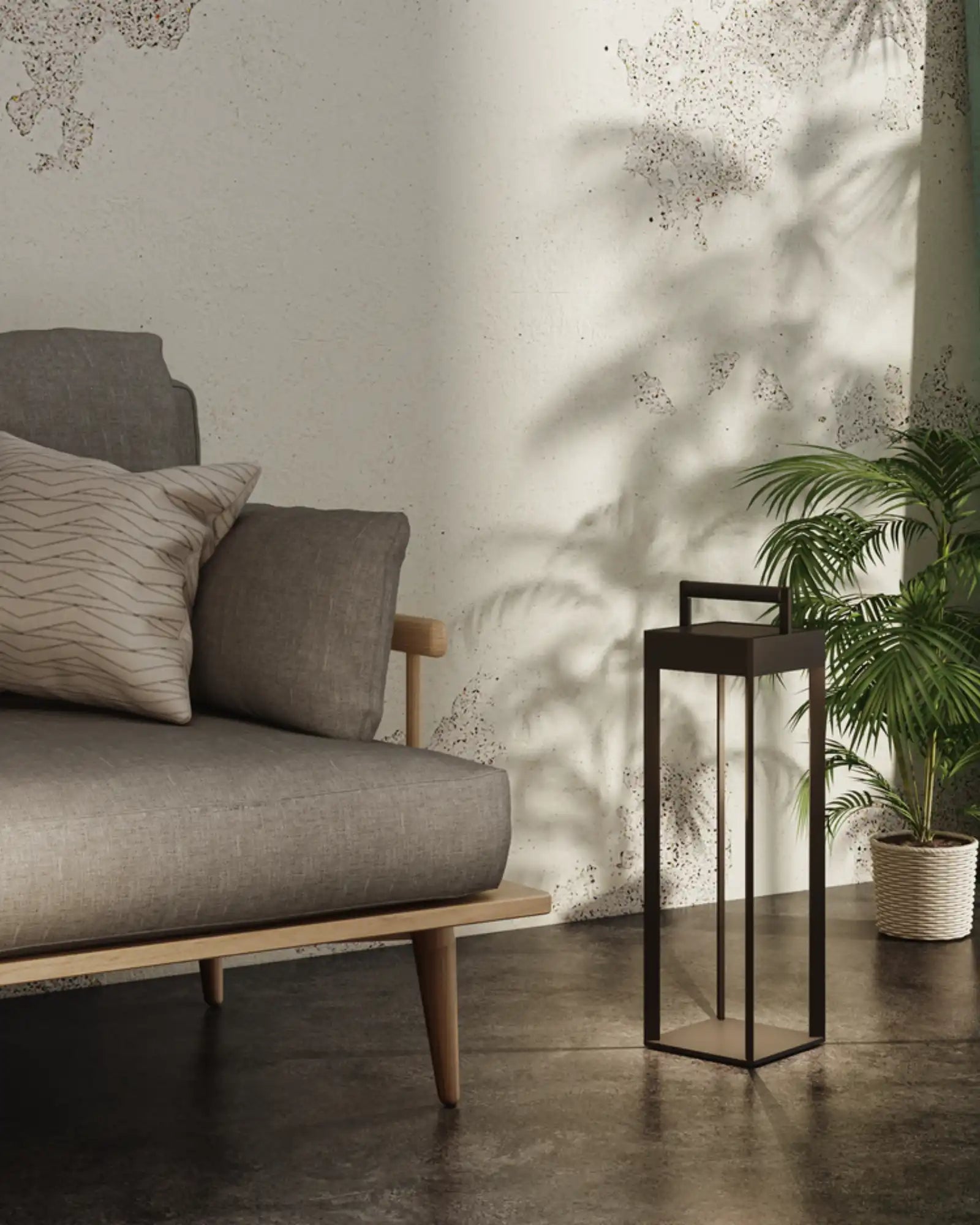 Kuro Portable Table Lamp by Astro Lighting featured within a contemporary living room | Nook Collections