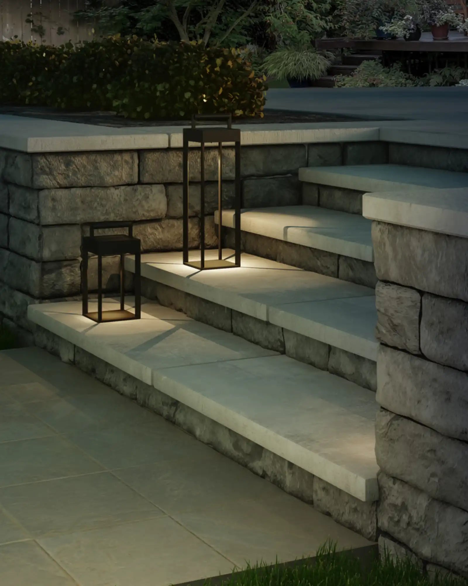 Kuro Portable Table Lamp by Astro Lighting featured in a garden | Nook Collections