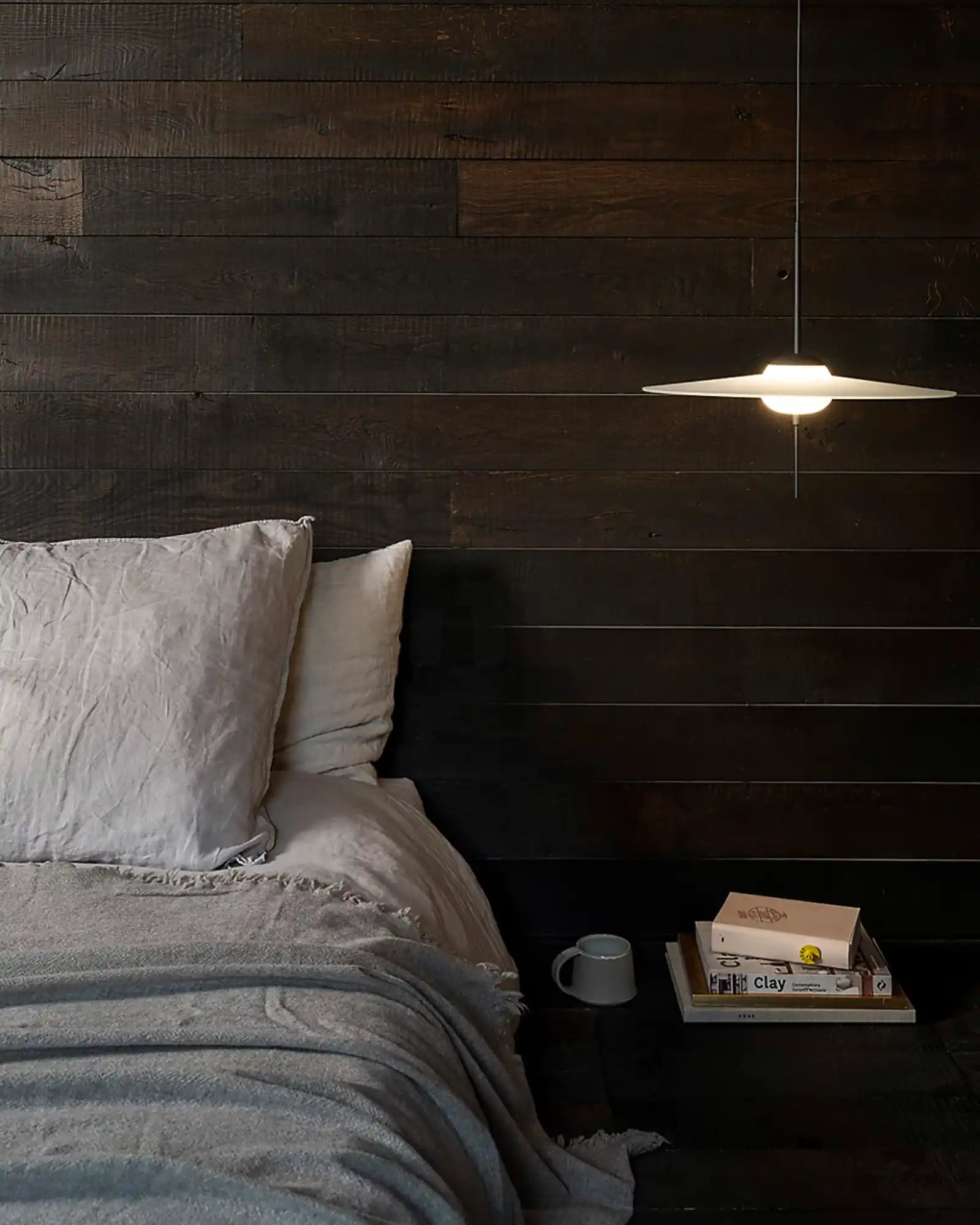 Mono Pendant Light by DCW Editions featured within a contemporary contemporary bedroom | Nook Collections