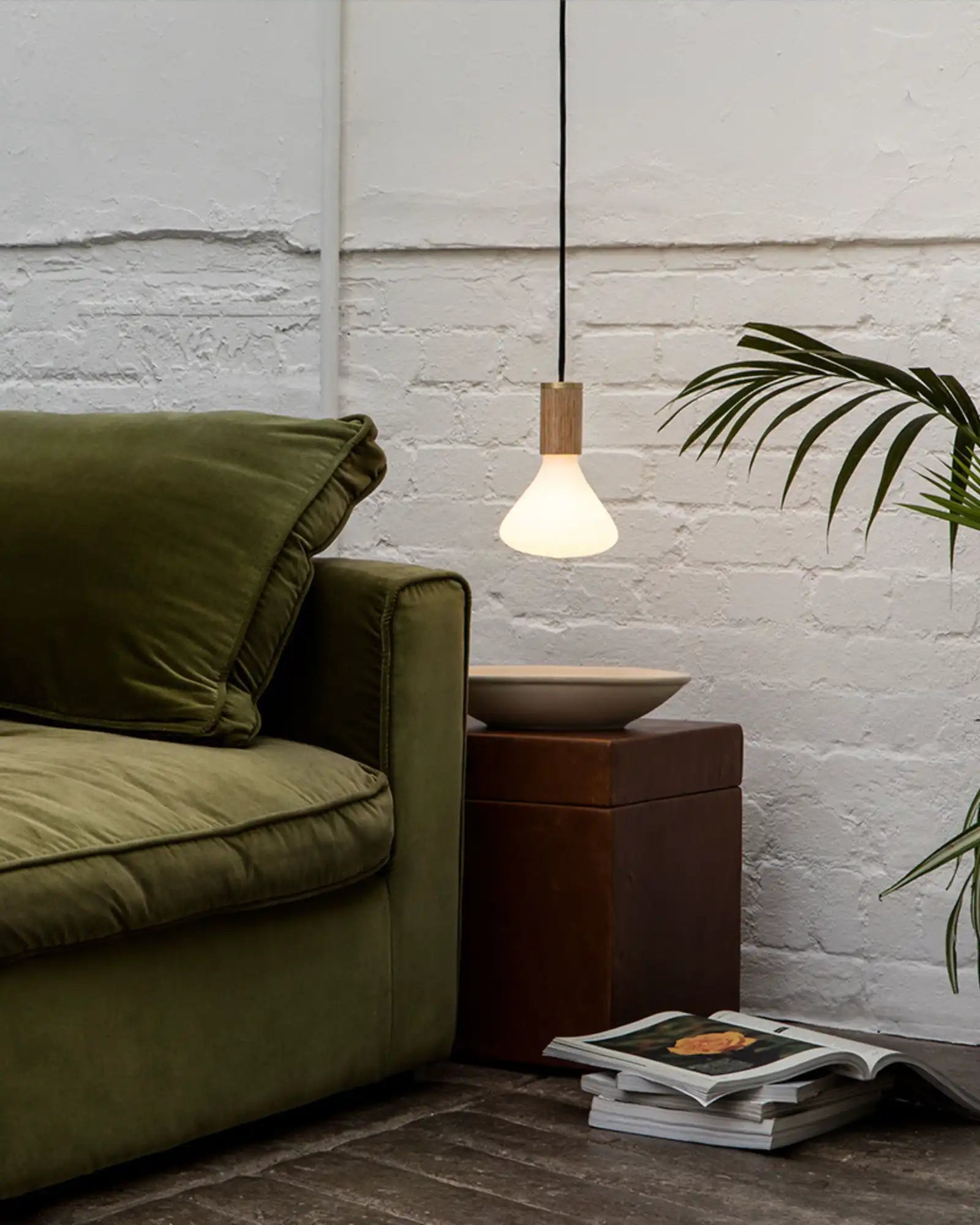 Noma Pendant Light by Tala featured within a contemporary living room | Nook Collections