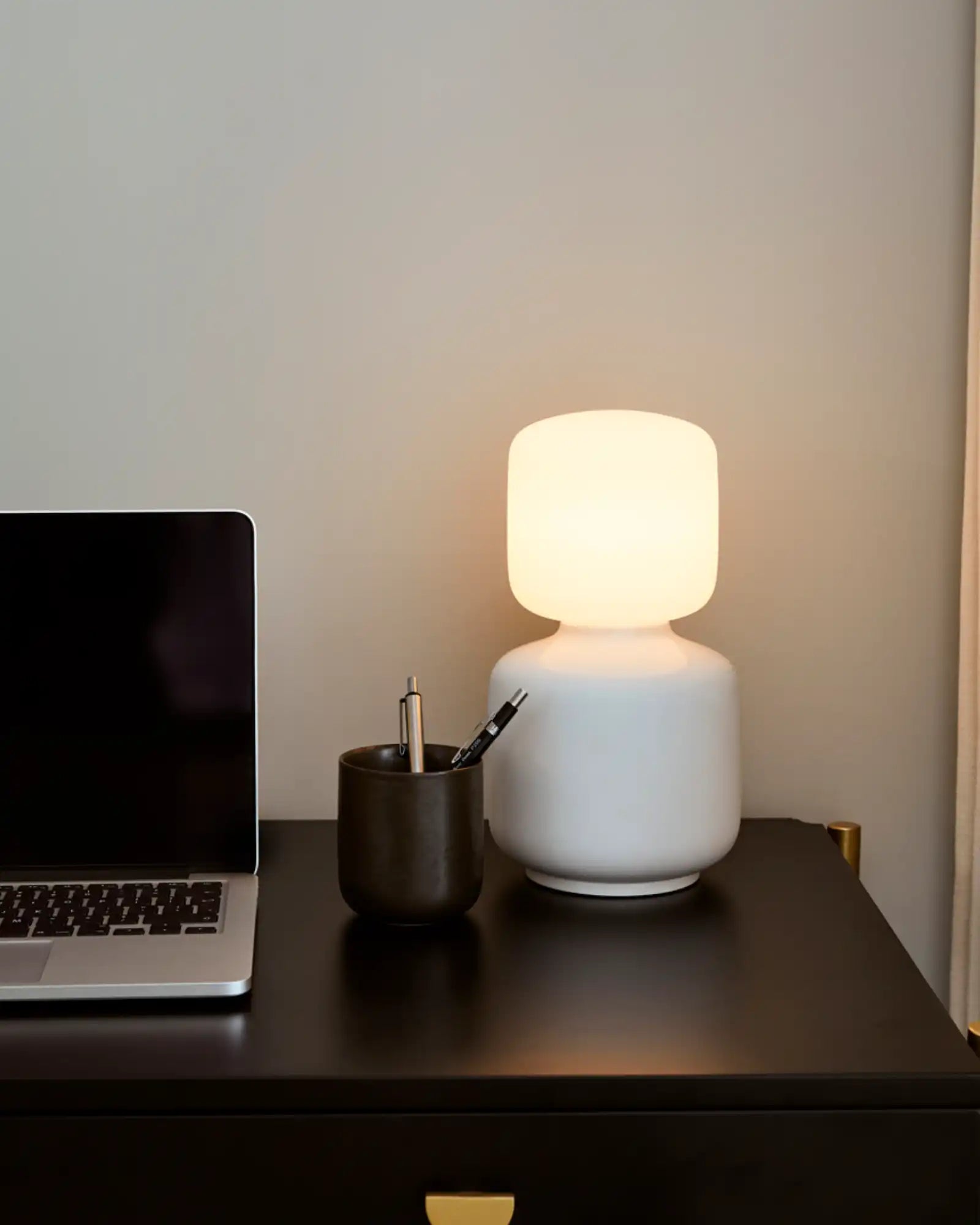 Oblo Reflection Table Lamp by Tala featured within a contemporary home office | Nook Collections