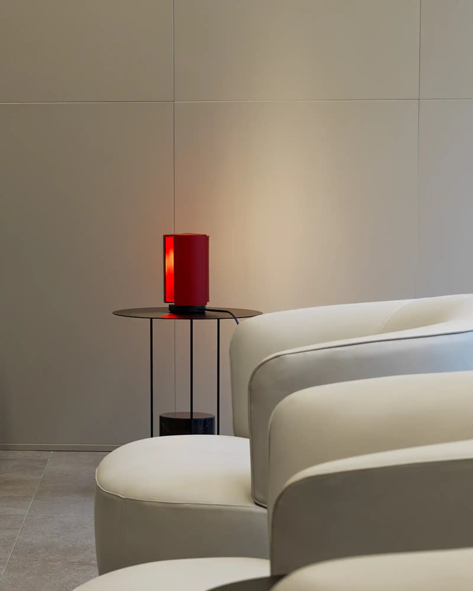 Pivotante A Poser Table Lamp by Nemo Lighting featured within a contemporary living room | Nook Collections