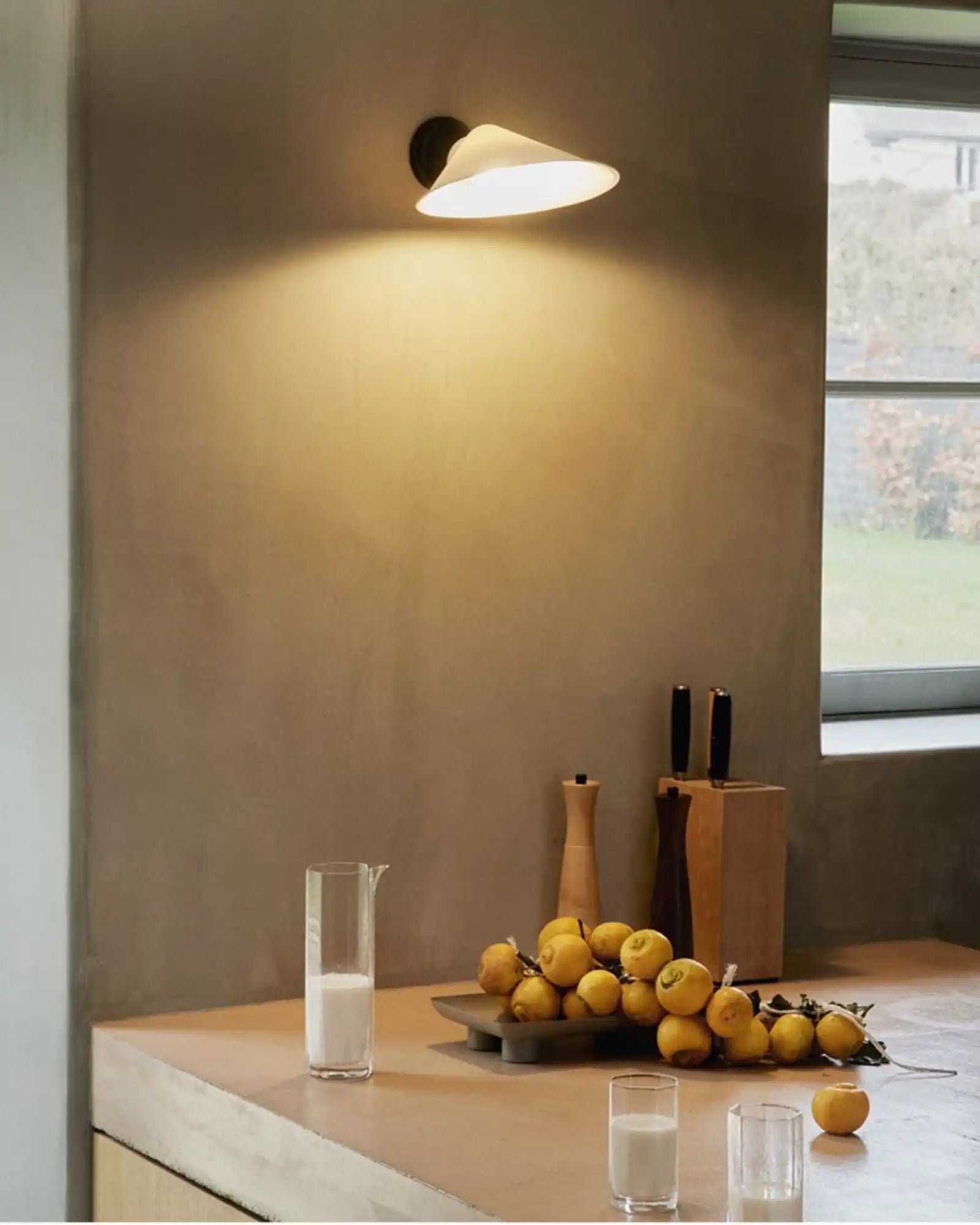 Plume Wall Light by DCW Editions featured within a contemporary kitchen | Nook Collections