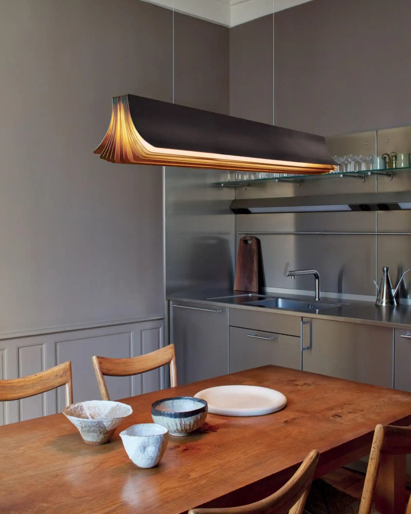 Respiro Pendant Light by DCW Editions featured within a contemporary dining room | Nook Collections