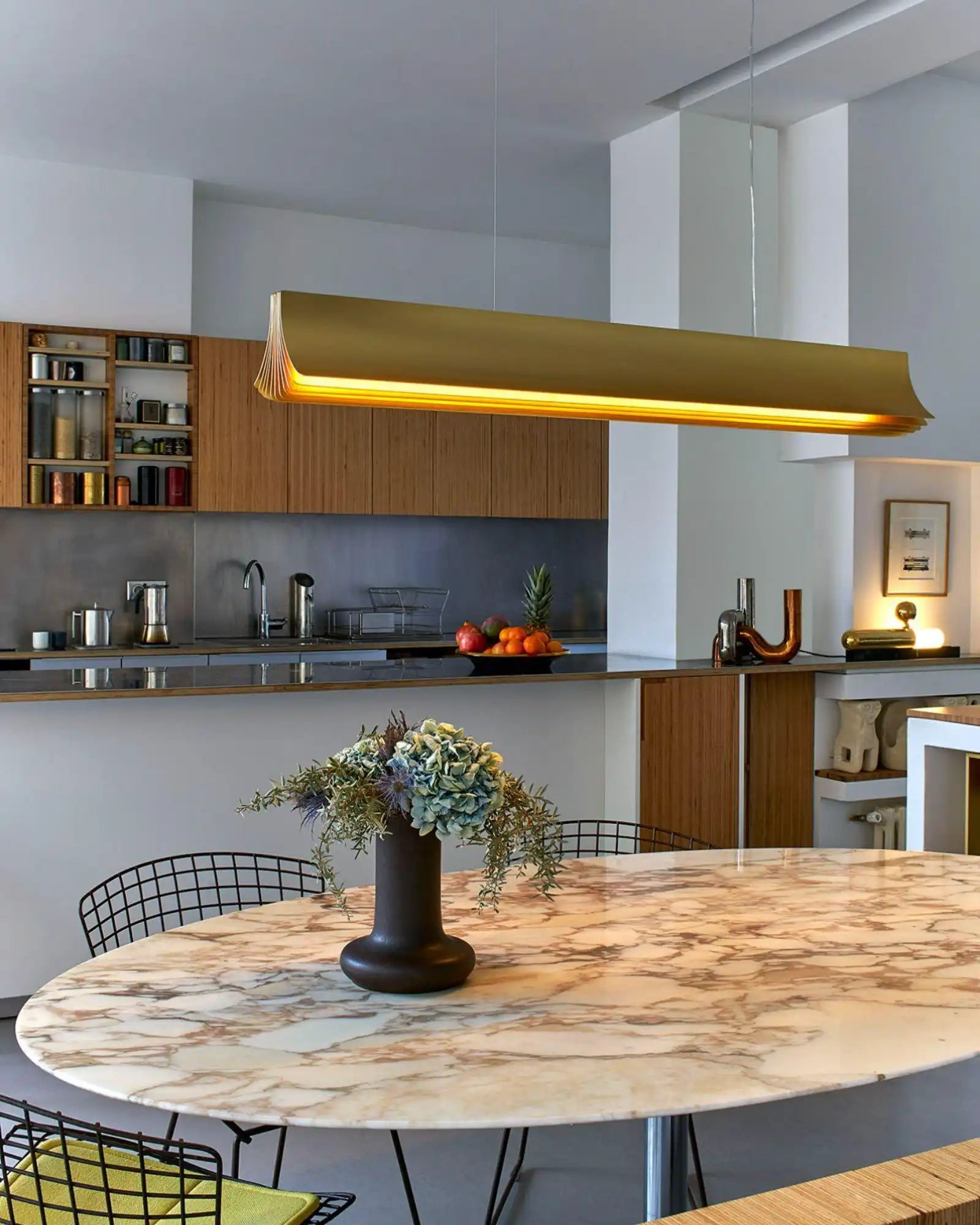 Respiro Pendant Light by DCW Editions featured within a contemporary dining room | Nook Collections