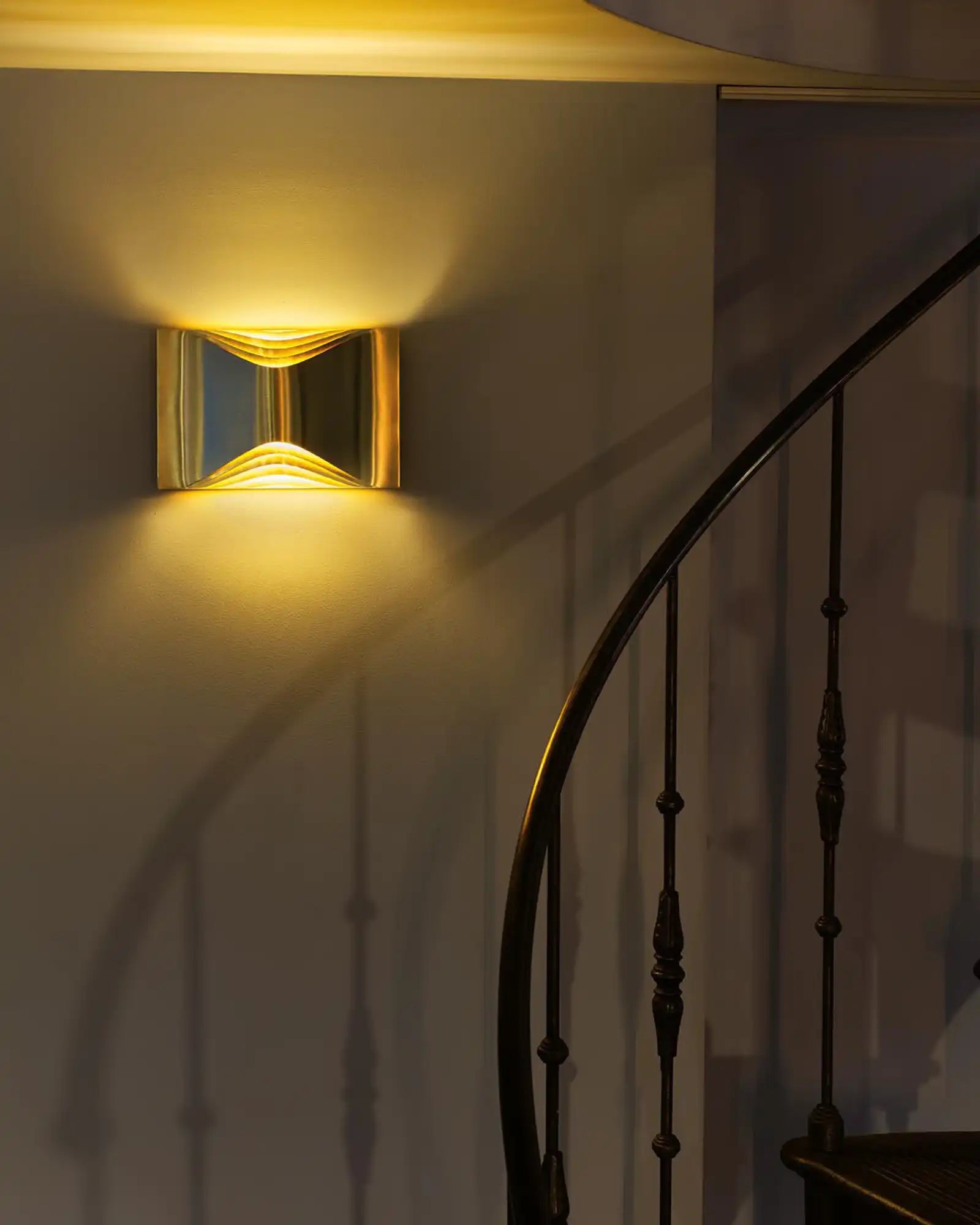 Respiro Wall Light by DCW Editions featured within a hallway | Nook Collections
