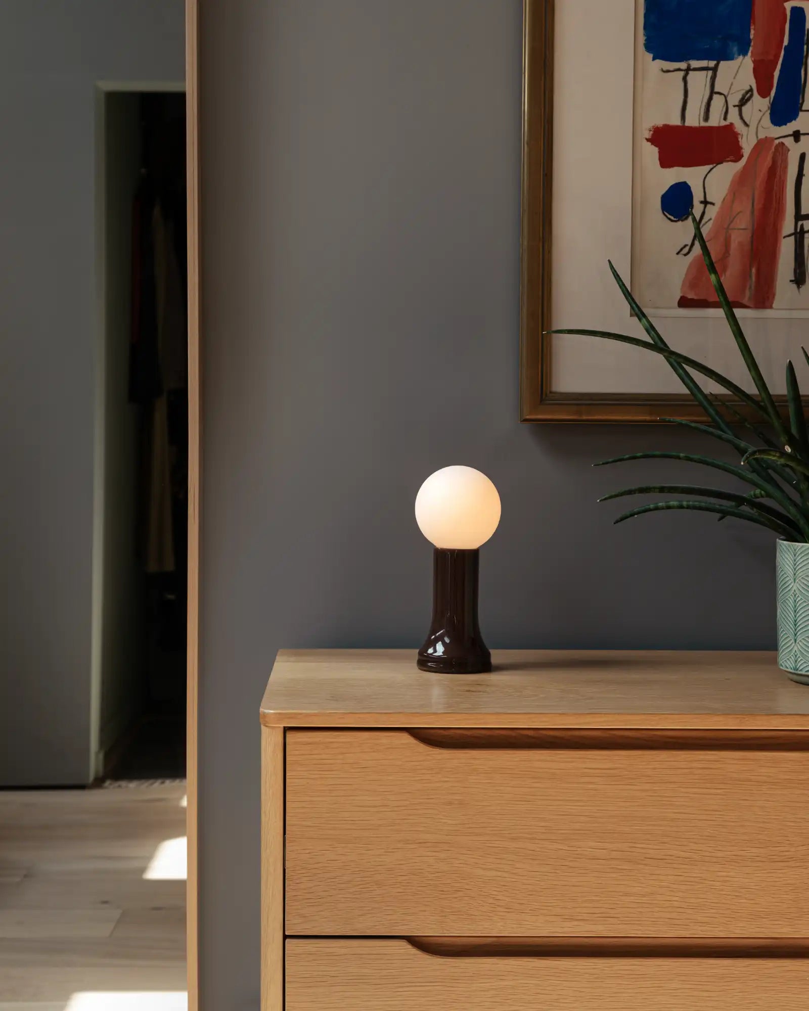 Shore Table Lamp by Tala featured in a modern contemporary closet | Nook Collections
