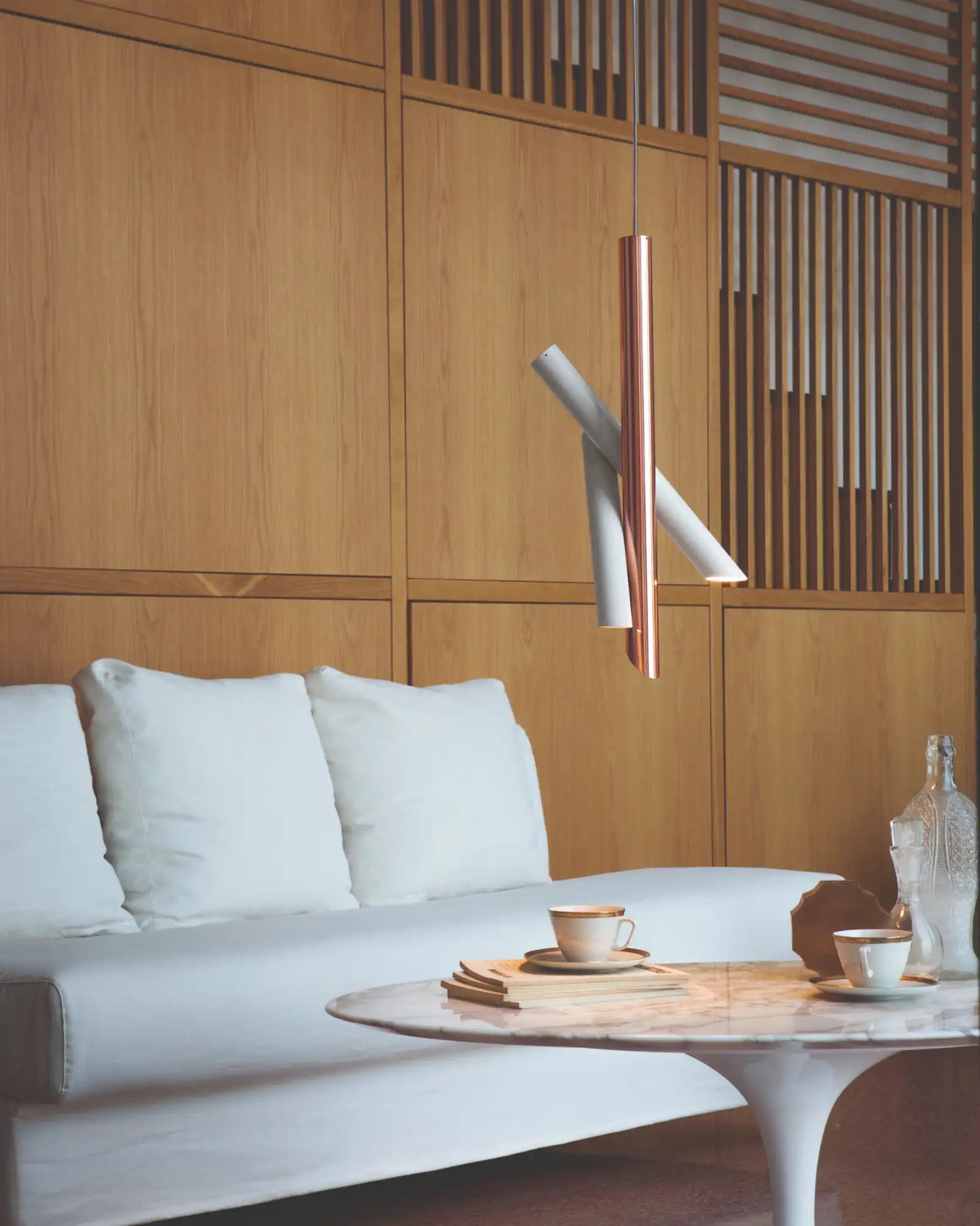Tubes 3 Pendant Light by Nemo Lighting featured in a modern contemporary living room | Nook Collections