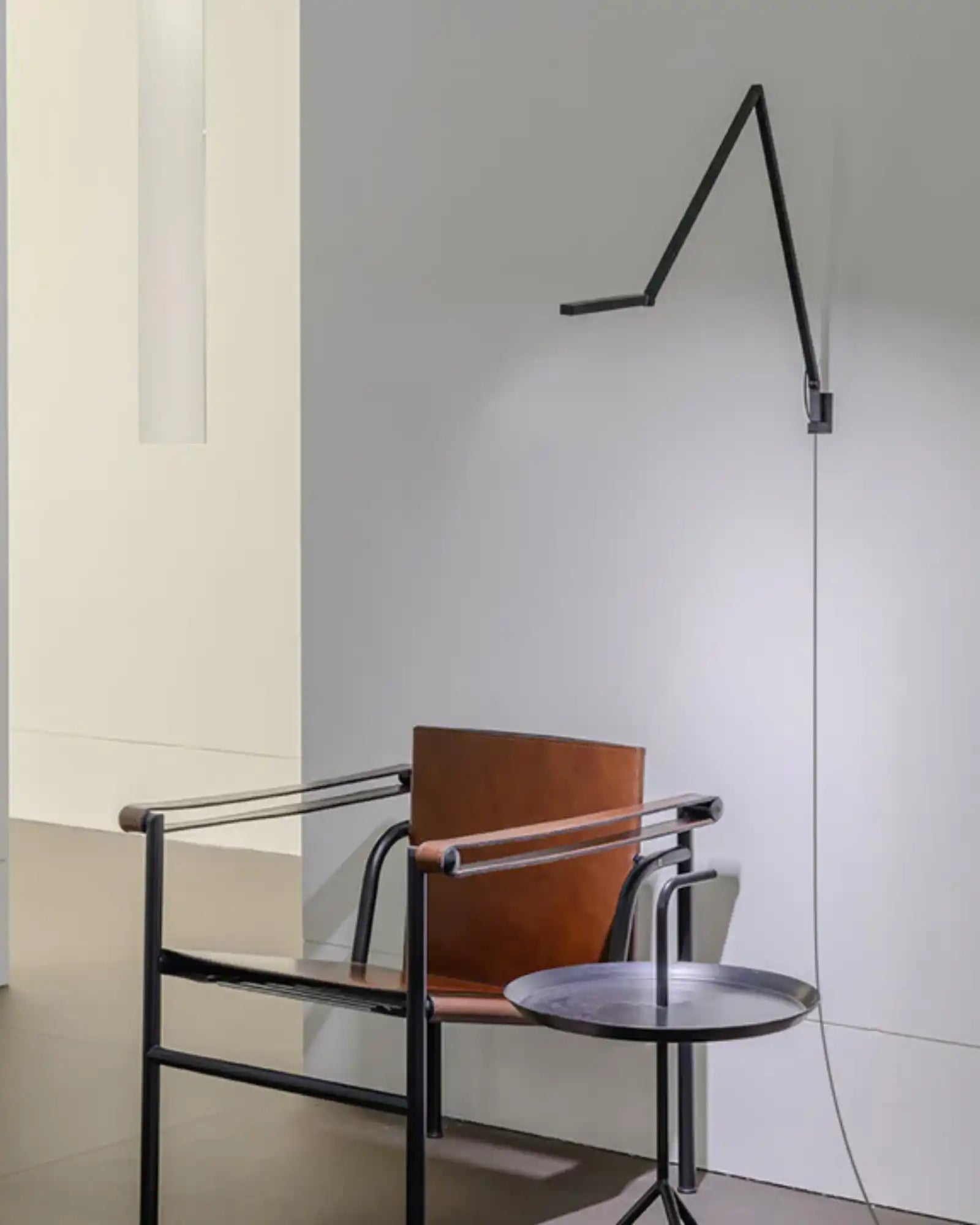 Untitled Linear Wall Light by Nemo Lighting featured in a modern contemporary living room | Nook Collections