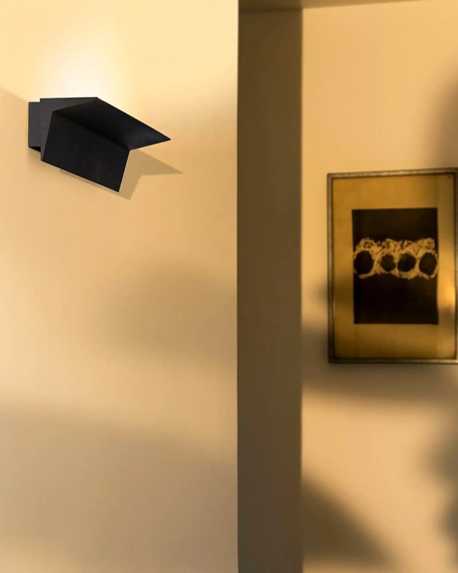Zena Wall Light by Nemo Lighting featured in a hallway | Nook Collections