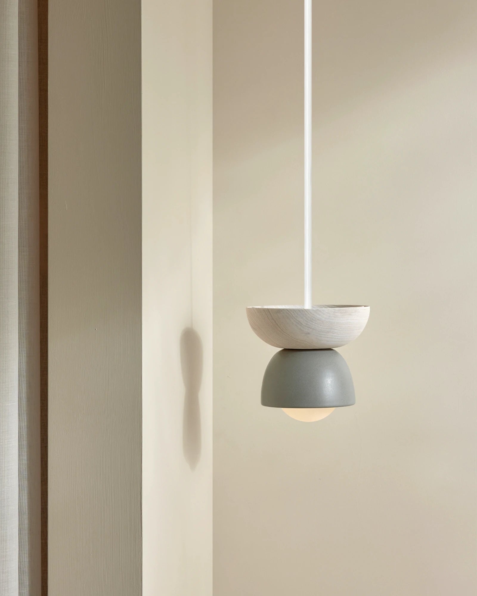 Terra 00 Rod Pendant Light with a bleached ash wood finish, fog ceramic finish, and white satin rod- Nook Collections