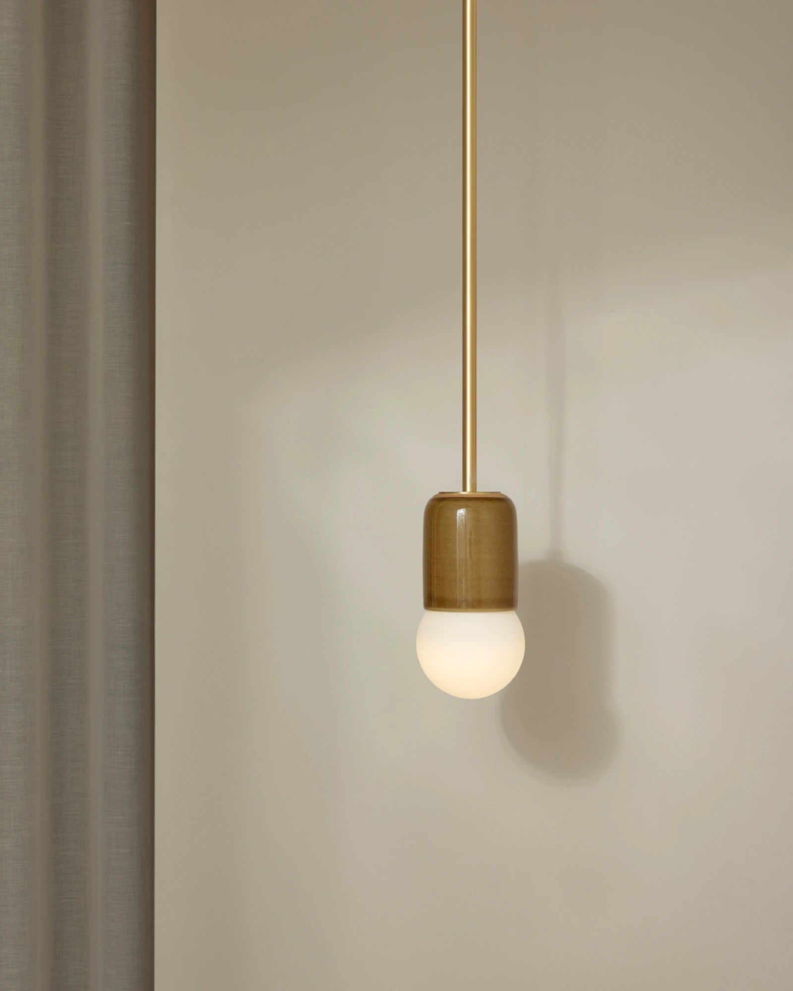 Terra 1 Pendant Light with Chartreuse ceramic finish and brass rod. -Nook Collections