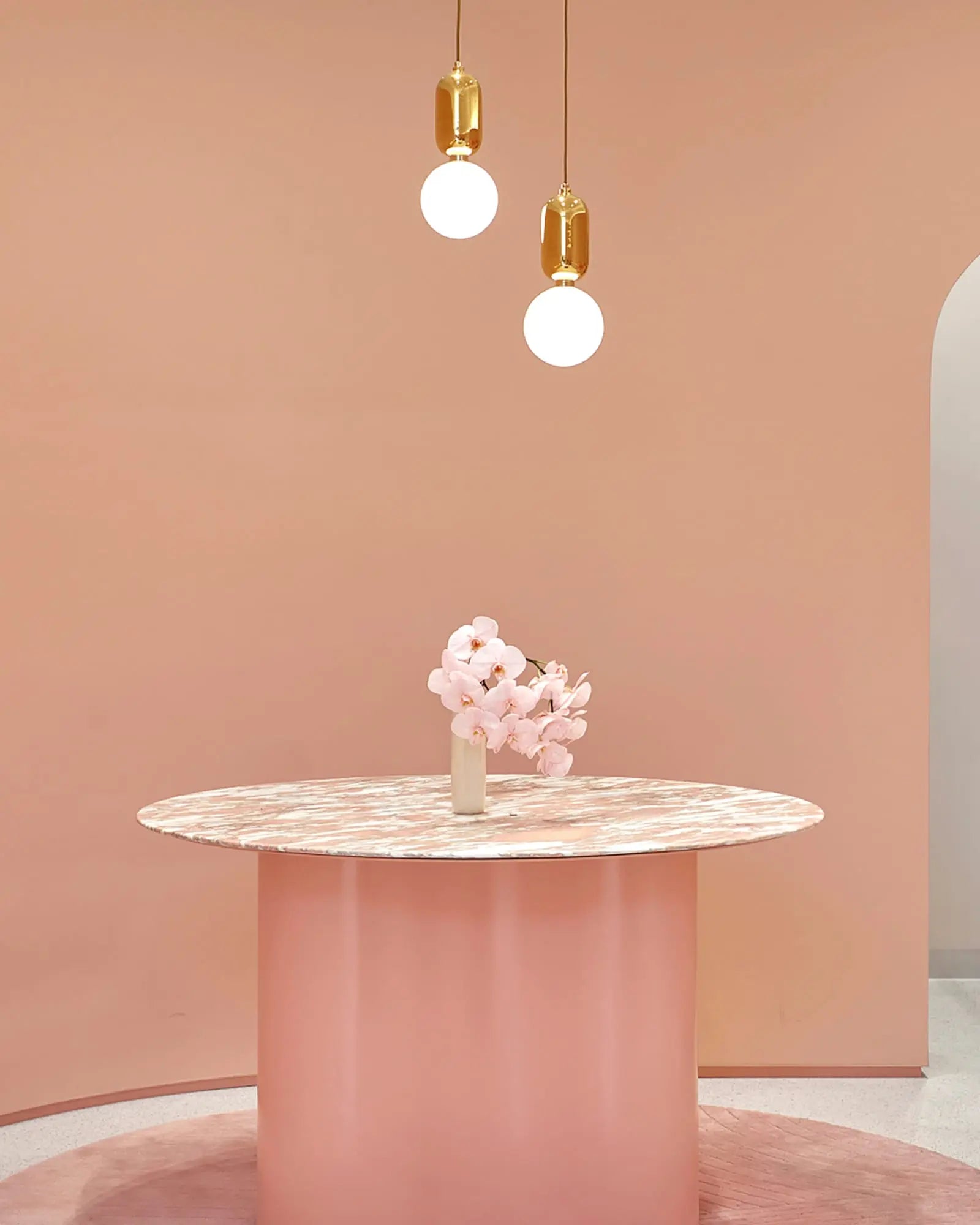 Aballs ceramic and orb blown glass shade pendant light above a round table