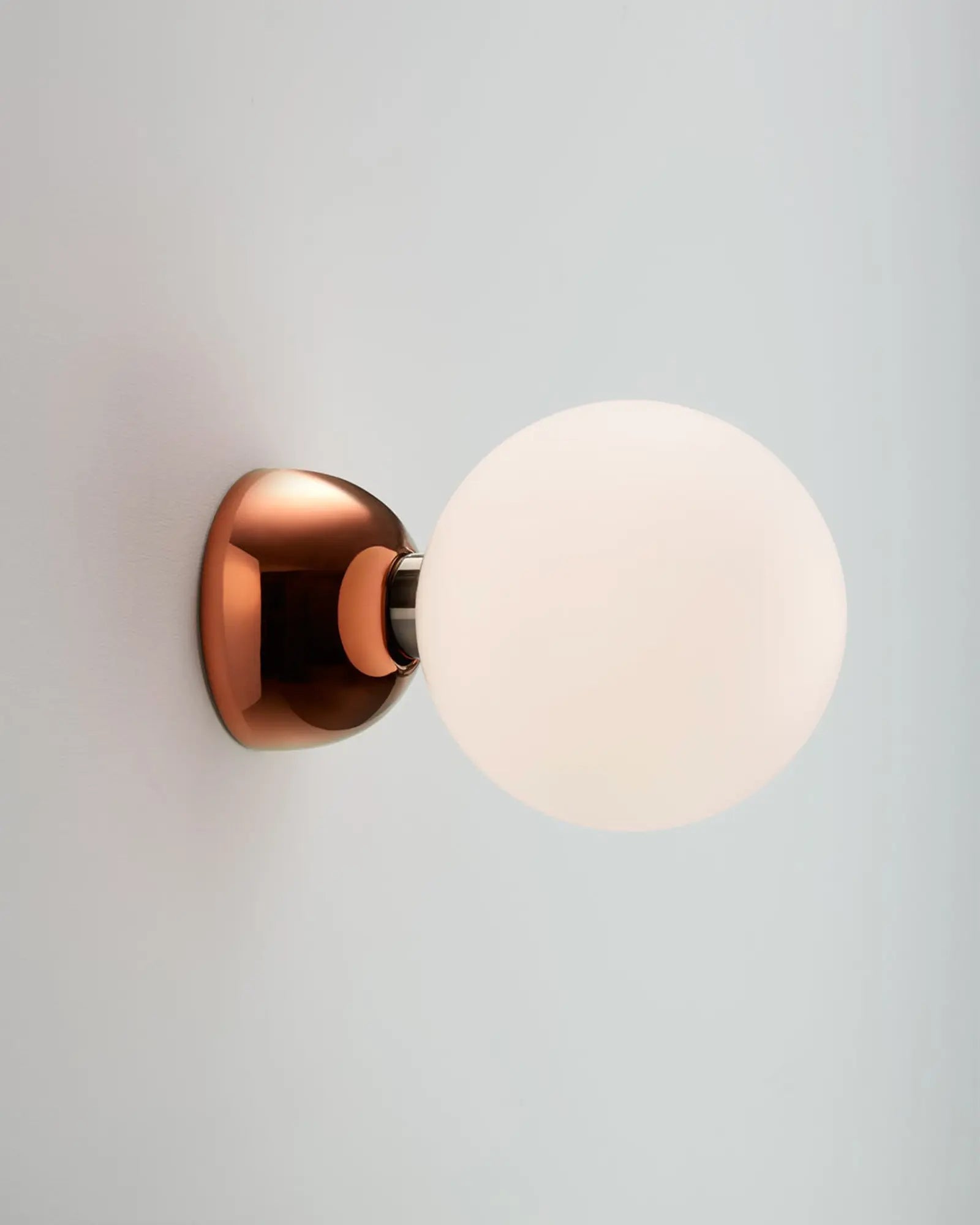 Aballs semi flush orb wall light with ceramic body and glass shade copper