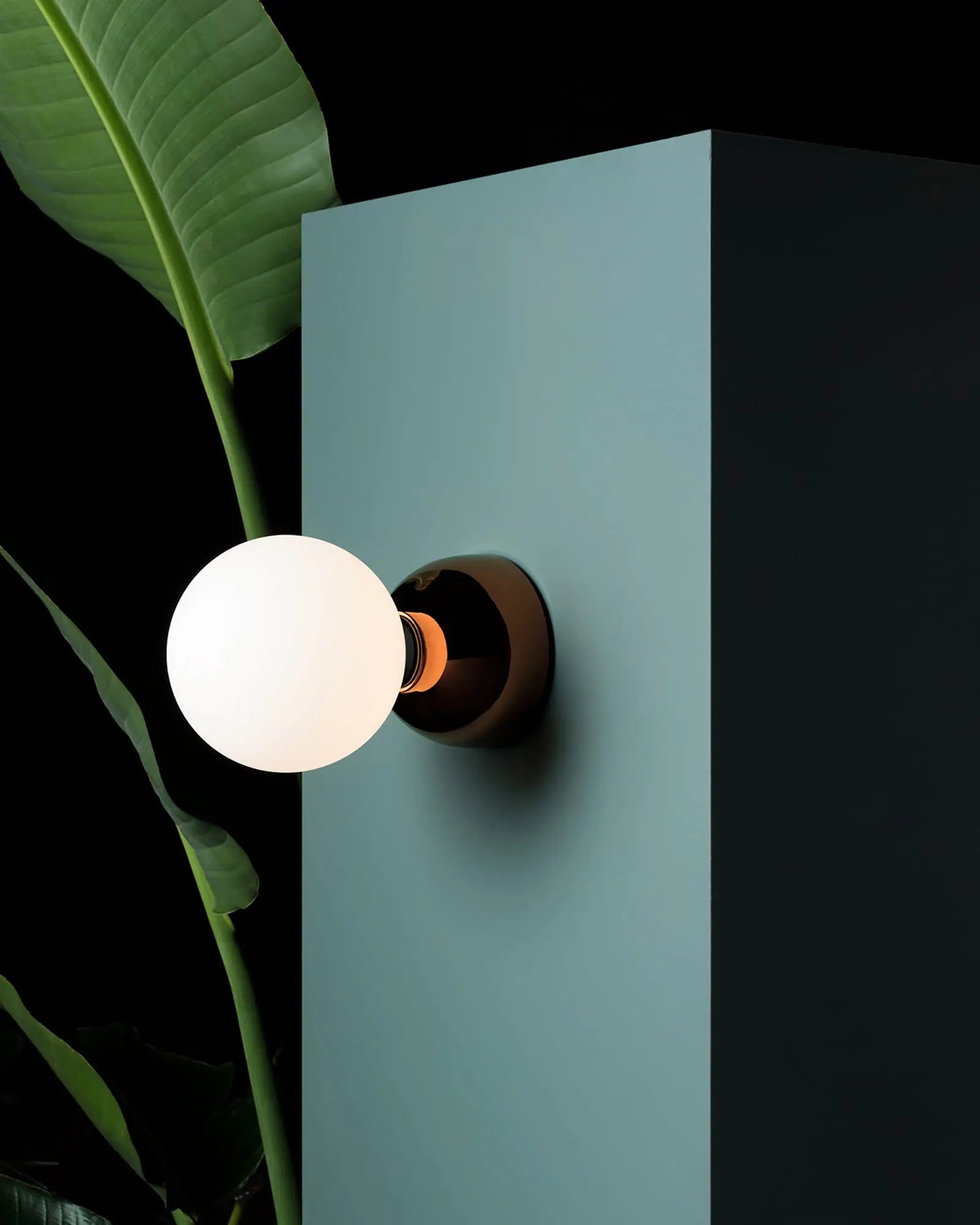 Aballs semi flush orb wall light with ceramic body and glass shade