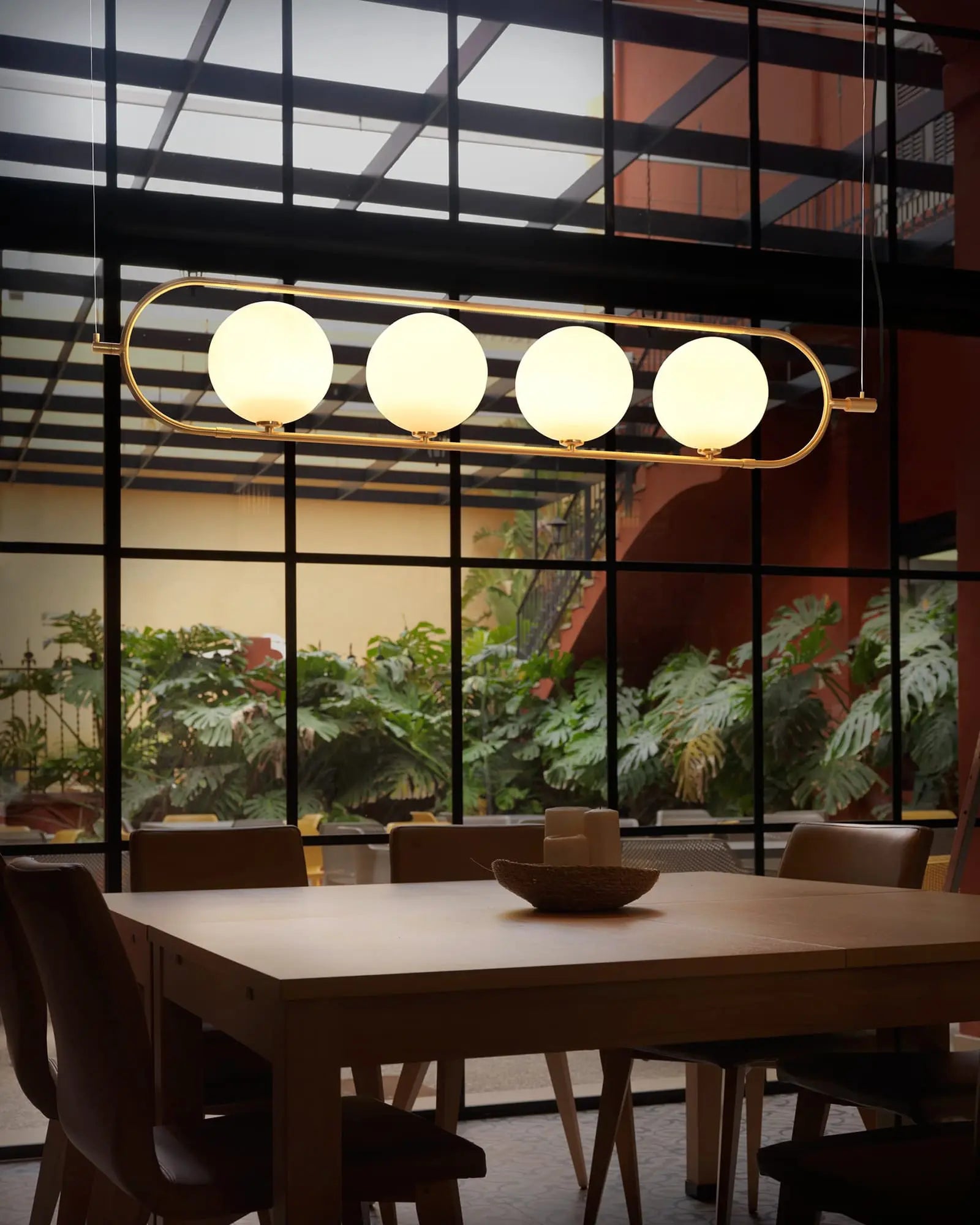 Abbacus pendant light 4 lights above a dining table