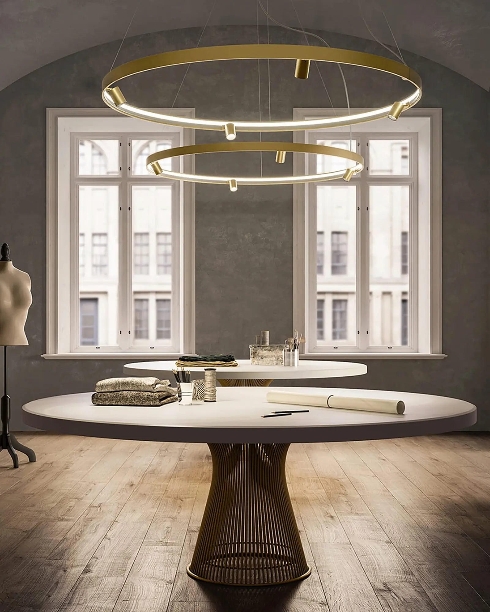 Arena circular pendant light with spotlight above a round table
