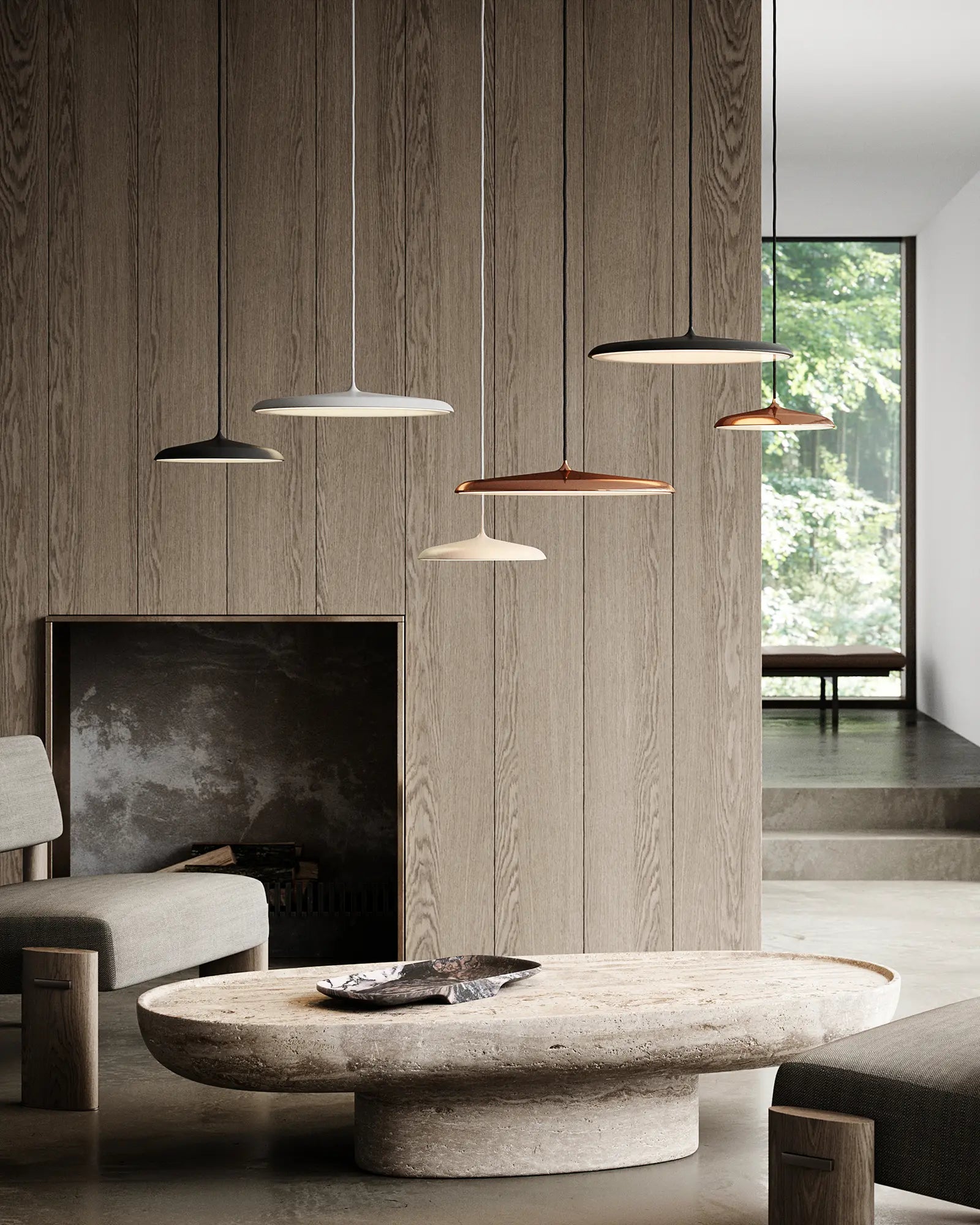 Artist Scandinavian flat dome pendant light cluster above a stone coffe table