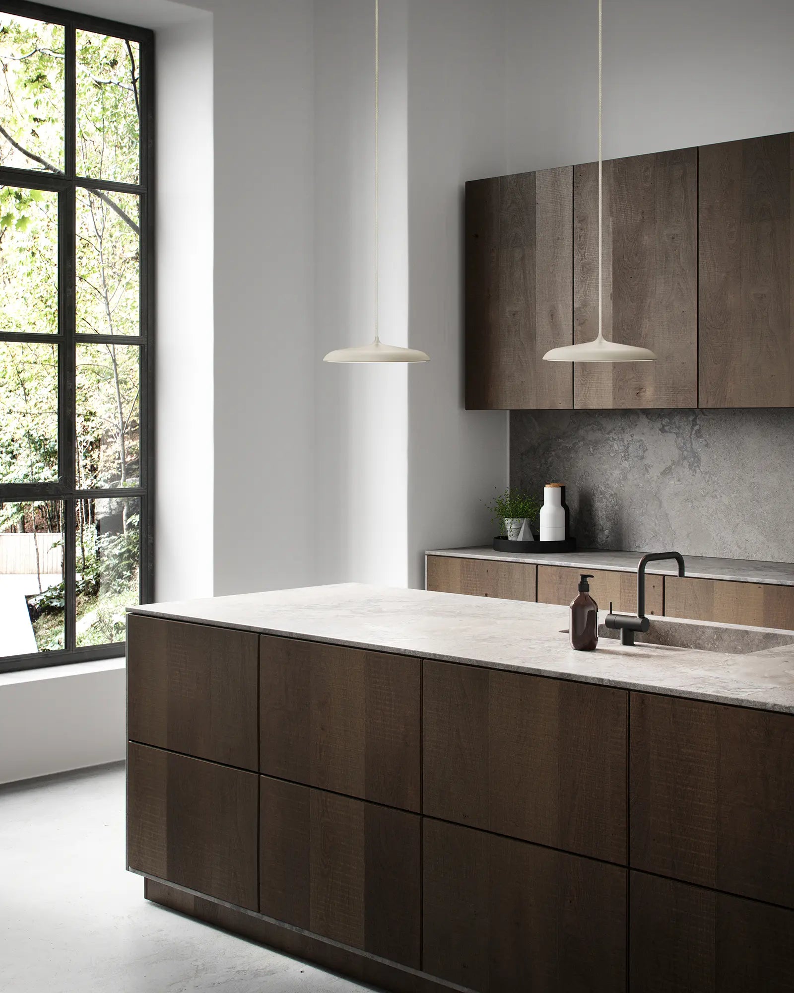 Artist Scandinavian flat dome pendant light cluster above a kitchen island