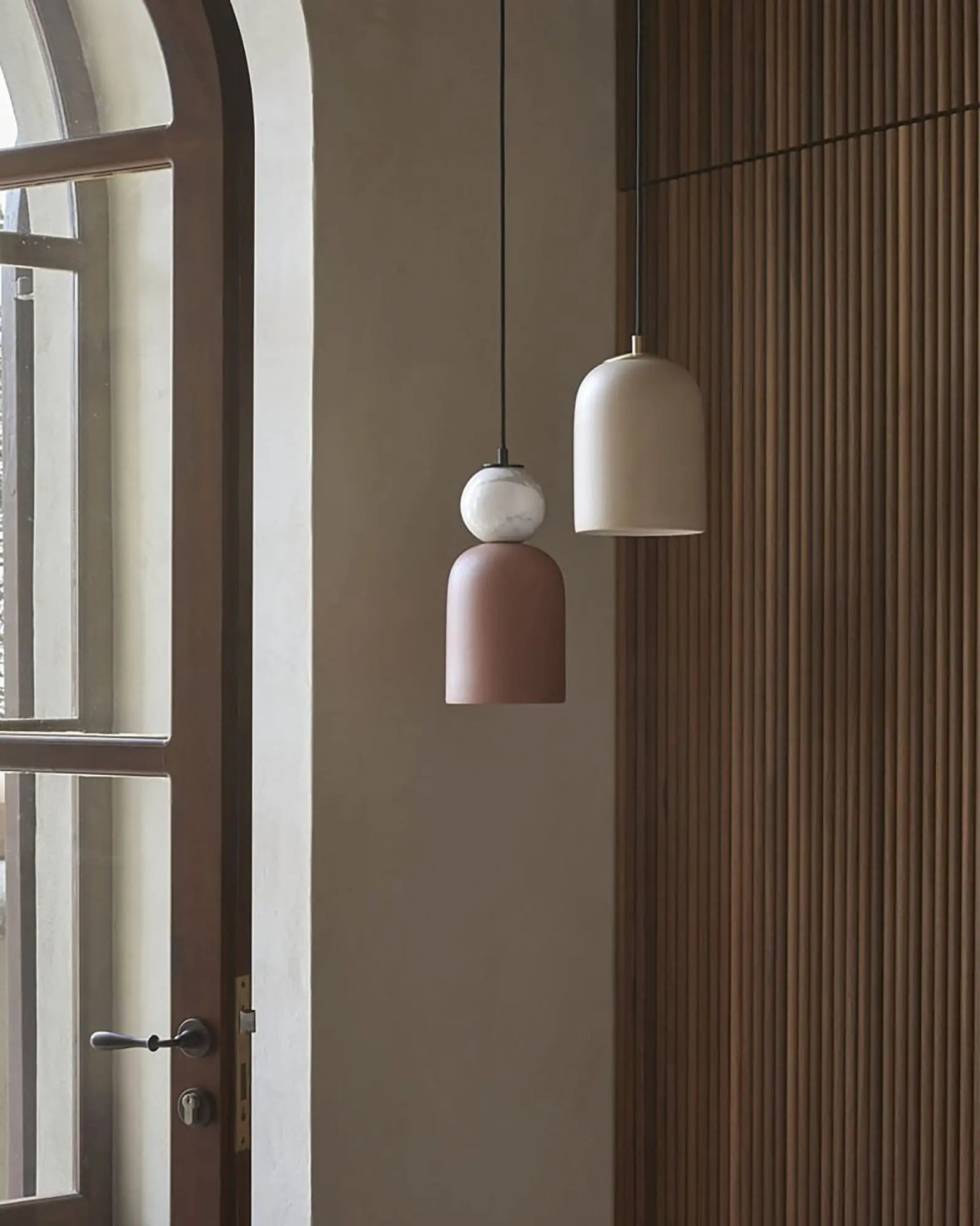 Bell copo pendant contemporary dome with marble sphere near entry door