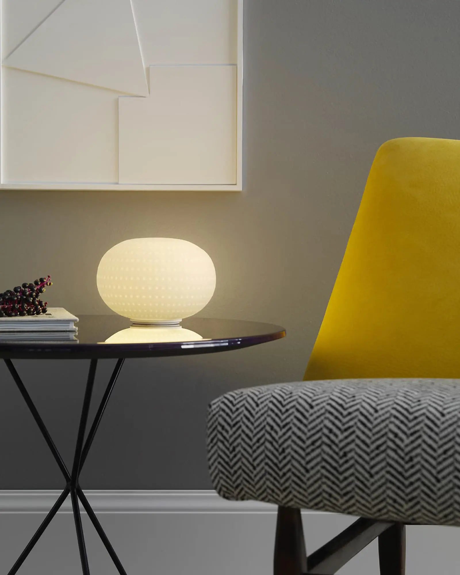 Bianca Table Lamp blown glass orb on a coffee table