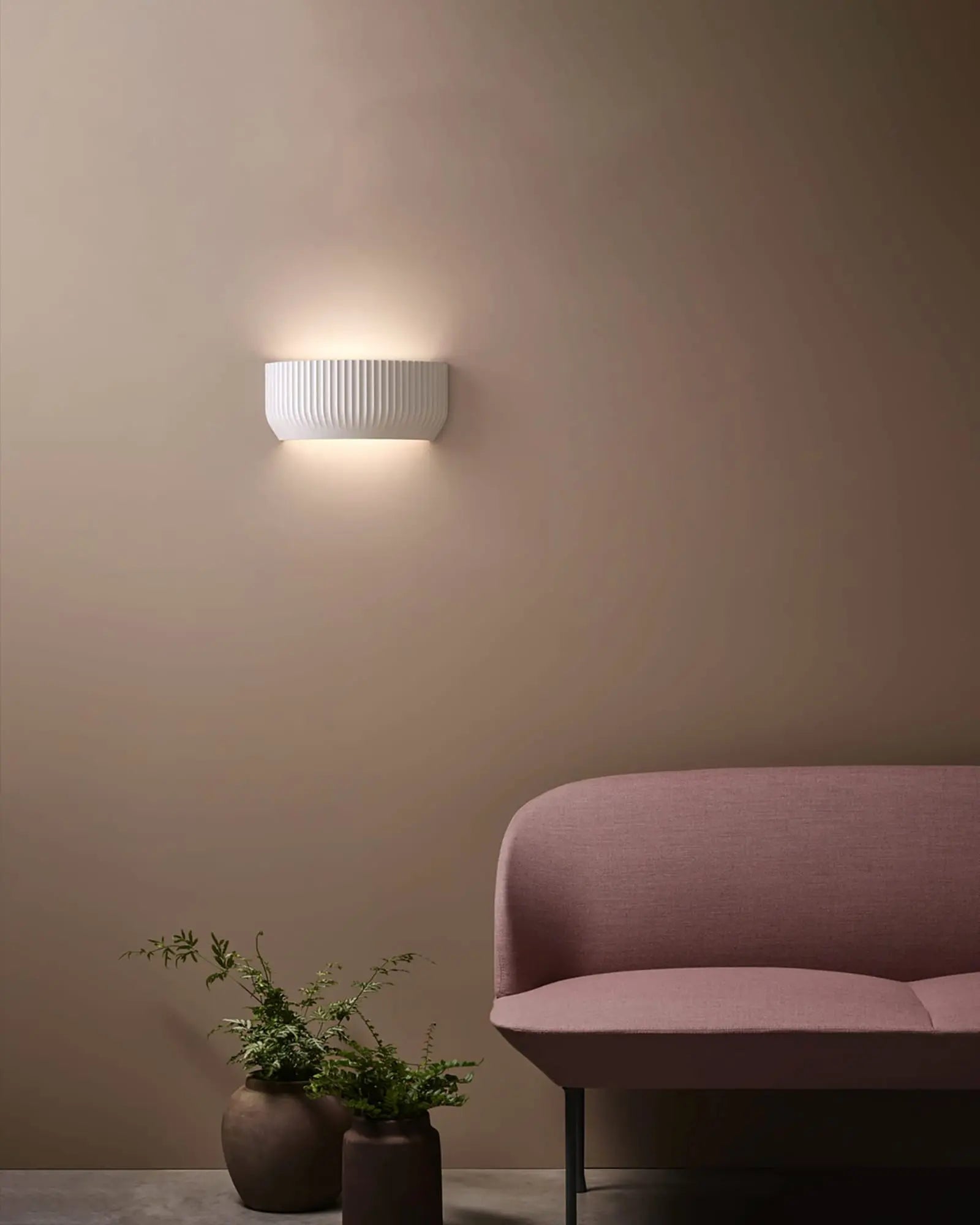 Blend plaster contemporary architectural style wall light on the sofa side