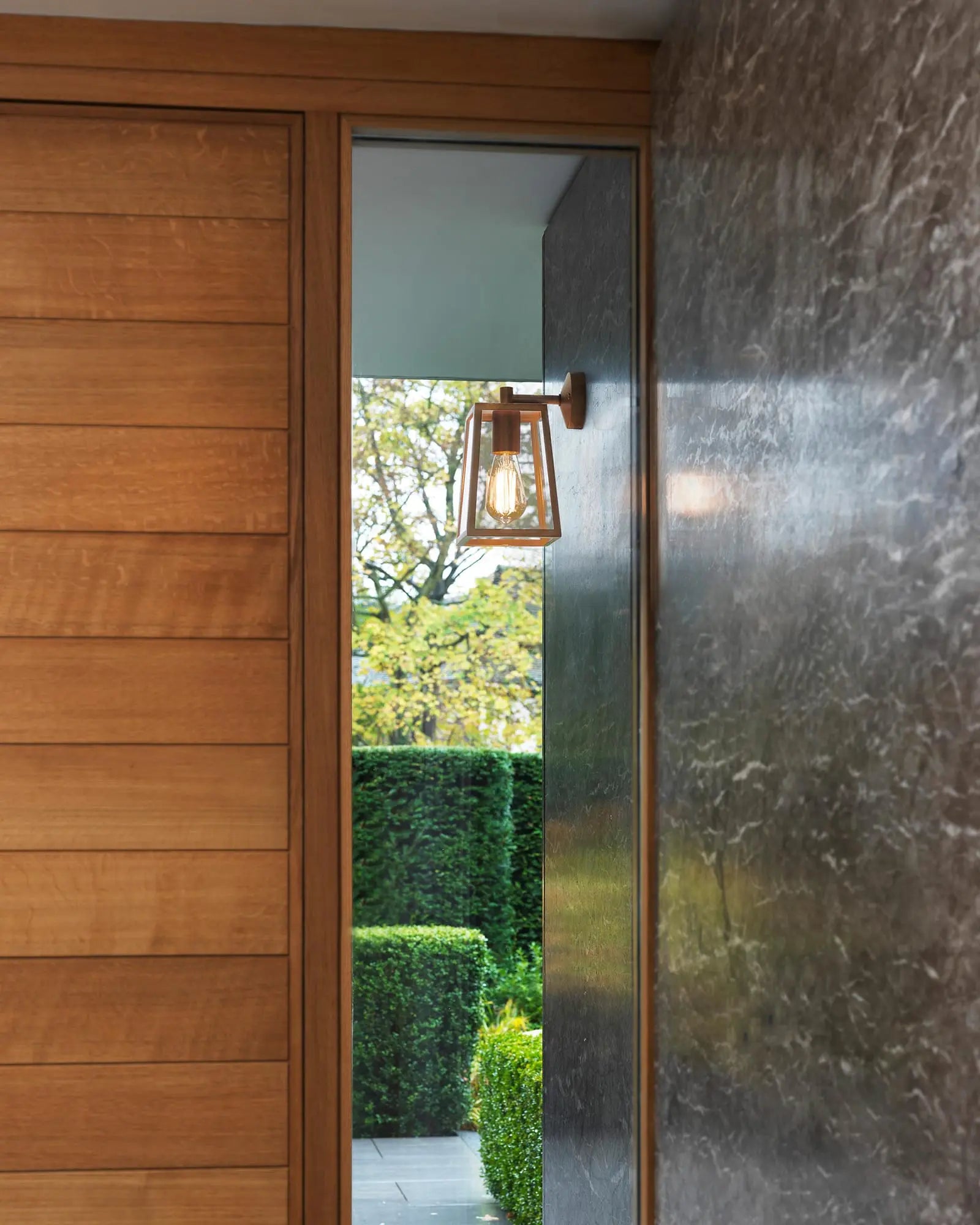 Calvi outdoor lantern style wall light near entry door