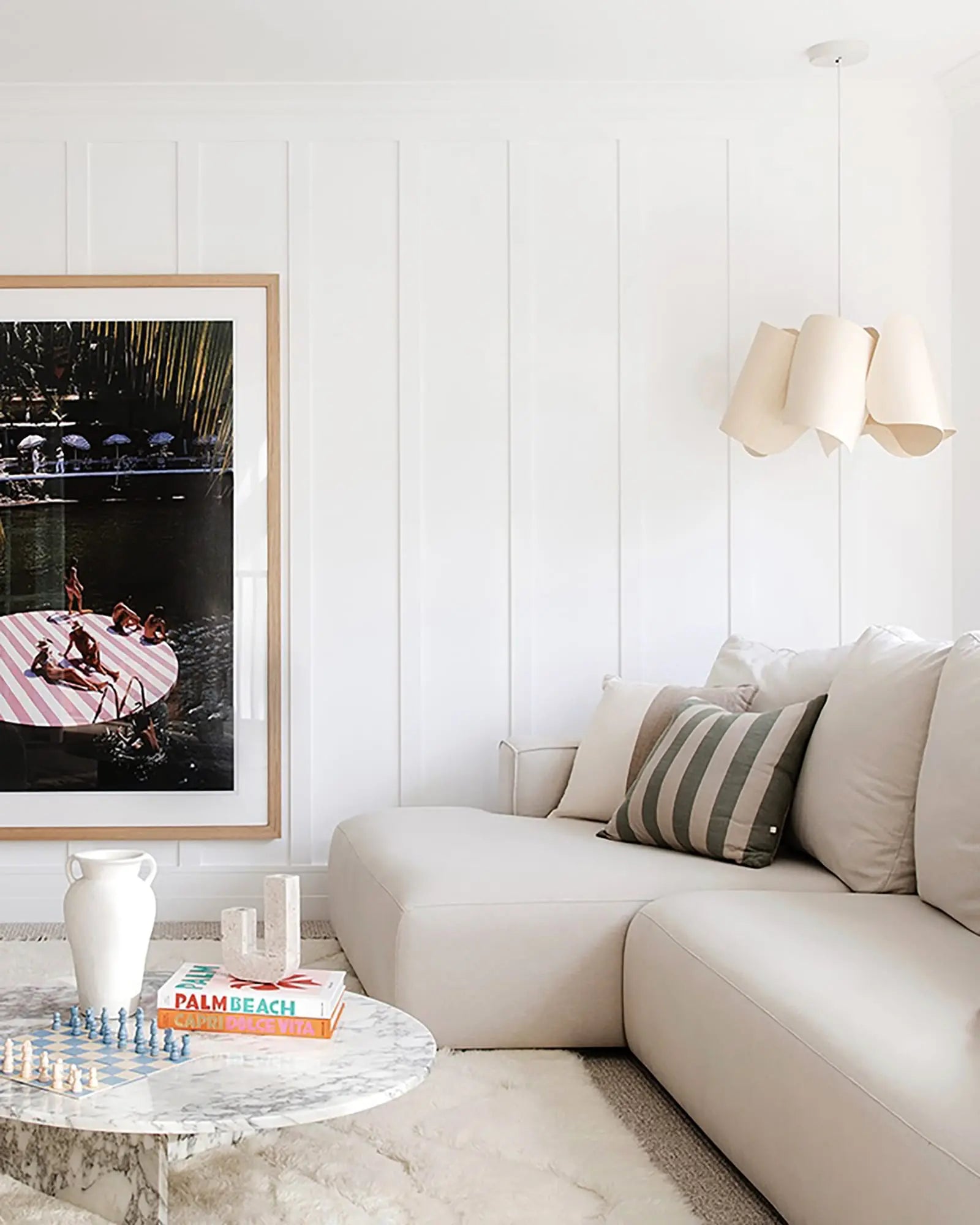 Camilla Veneer pendant light above a sofa
