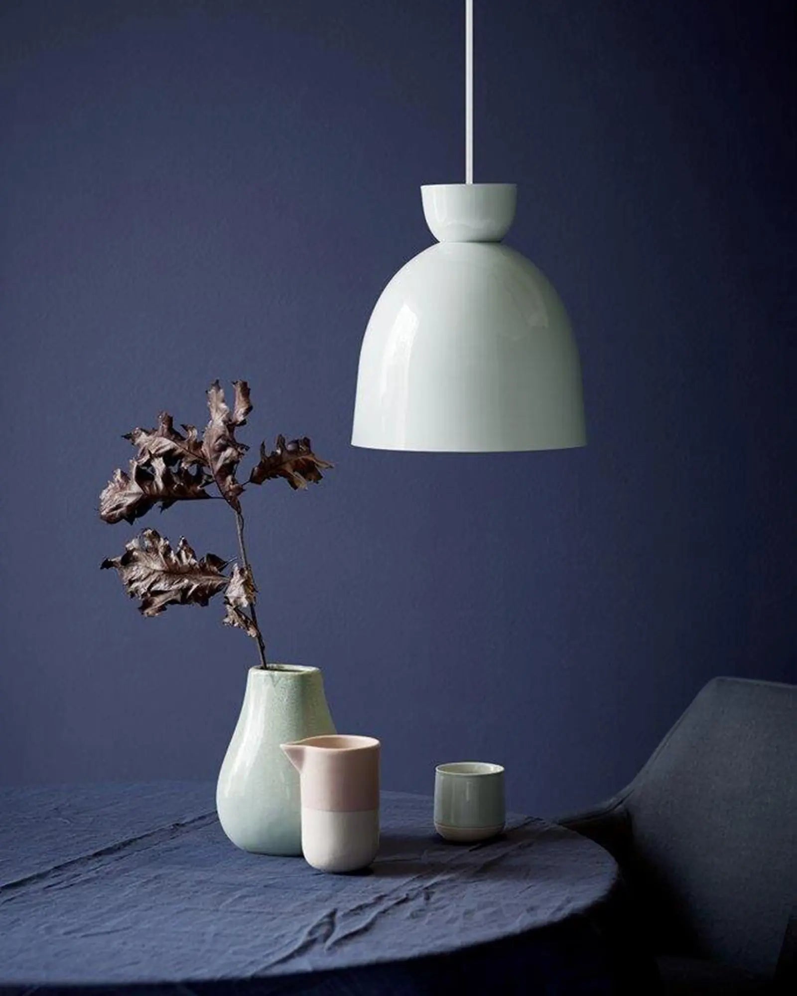 Circus contemporary Scandinavian pendant above a coffee table blue