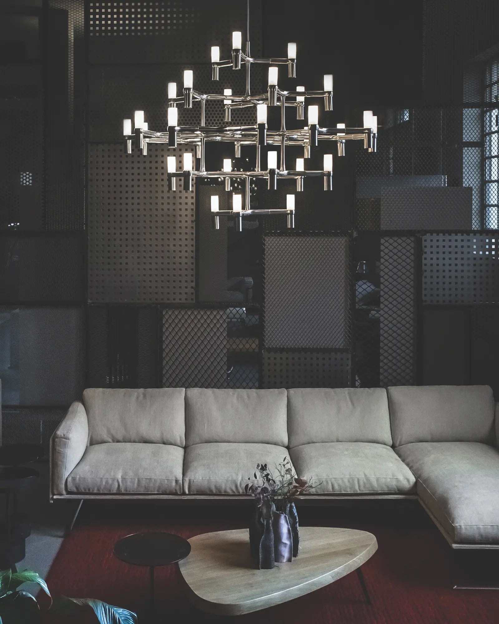 Crown major large chandelier above a coffee table