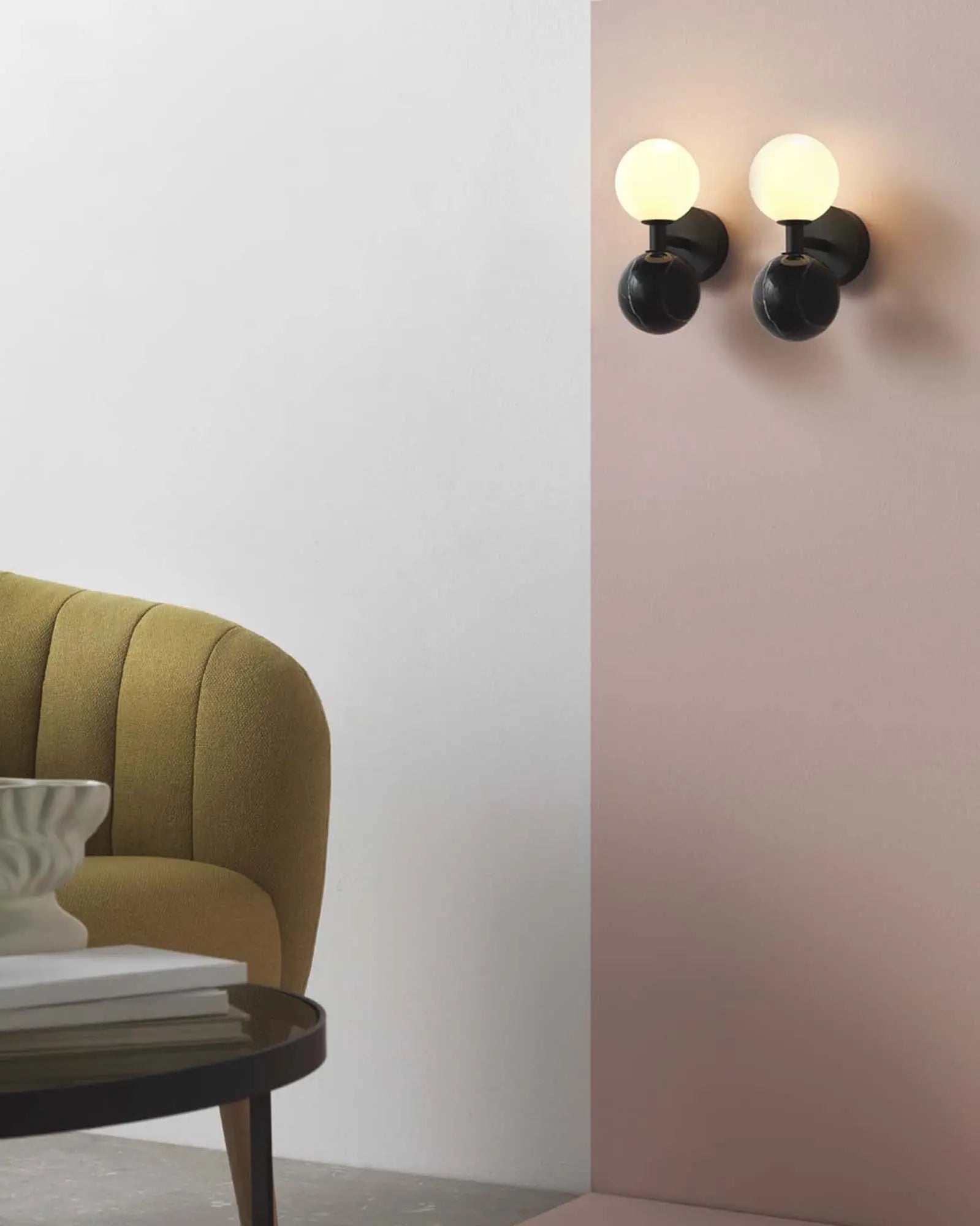 Dalt Wall light marble and opal glass spheres near a sofa