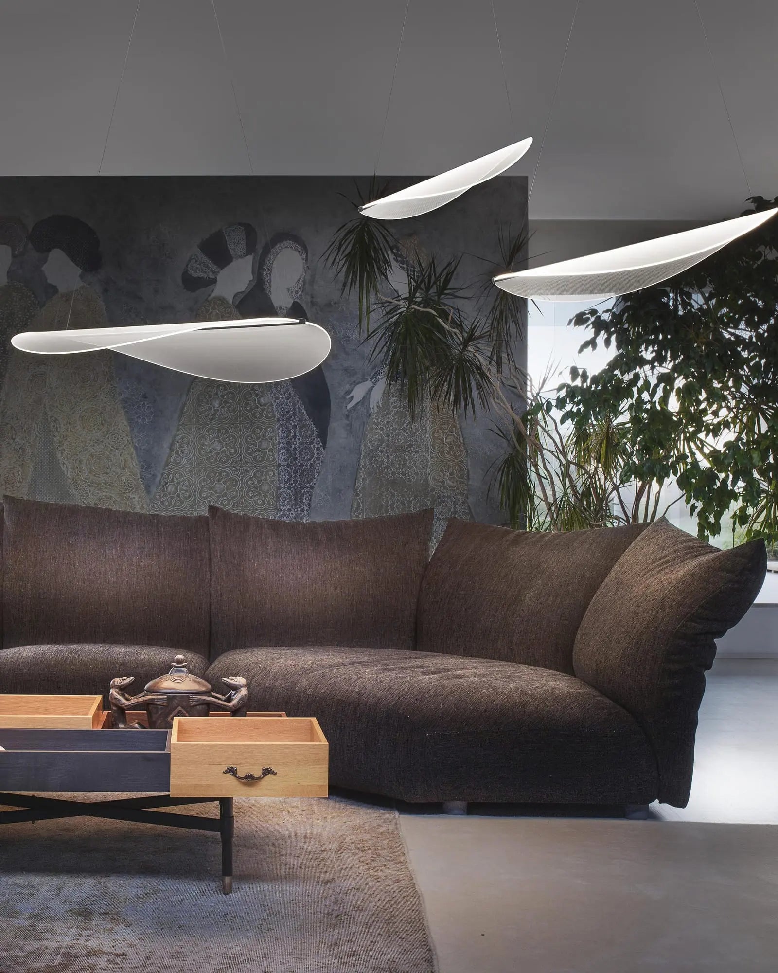Diphy pendant light above a sofa