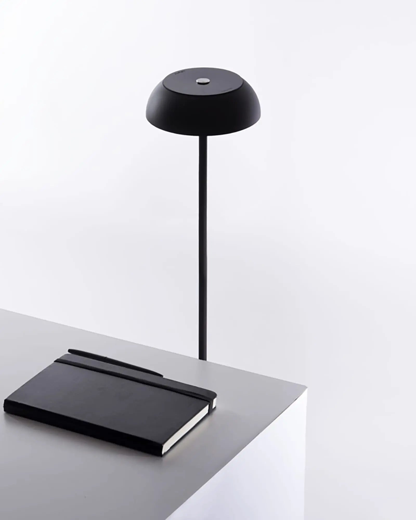Float outdoor and indoor rechargeable floor lamp near a desk
