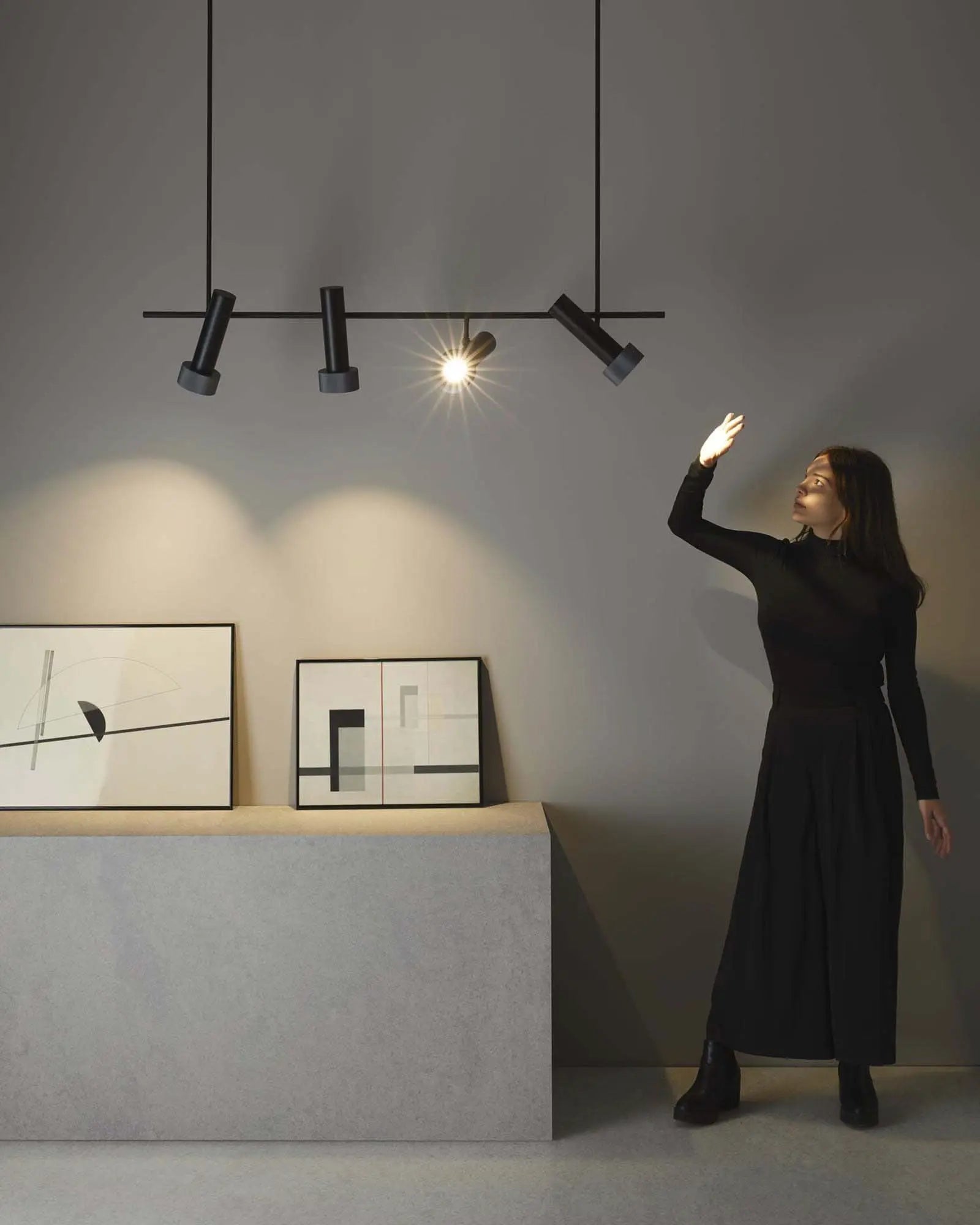 Focus Linear Pendant 4 lights  above a bench