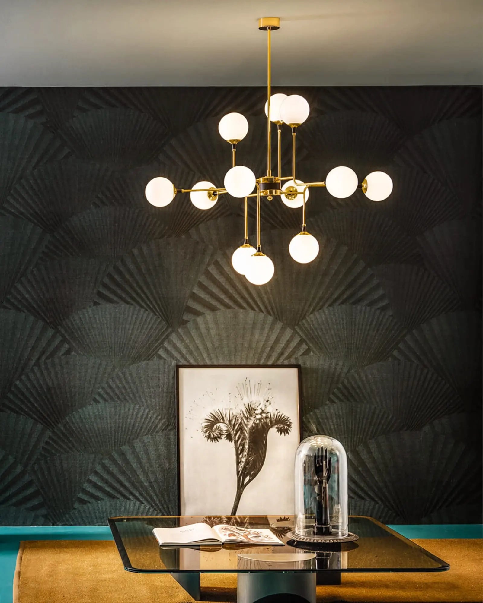 Galassia pendant light above a coffee table