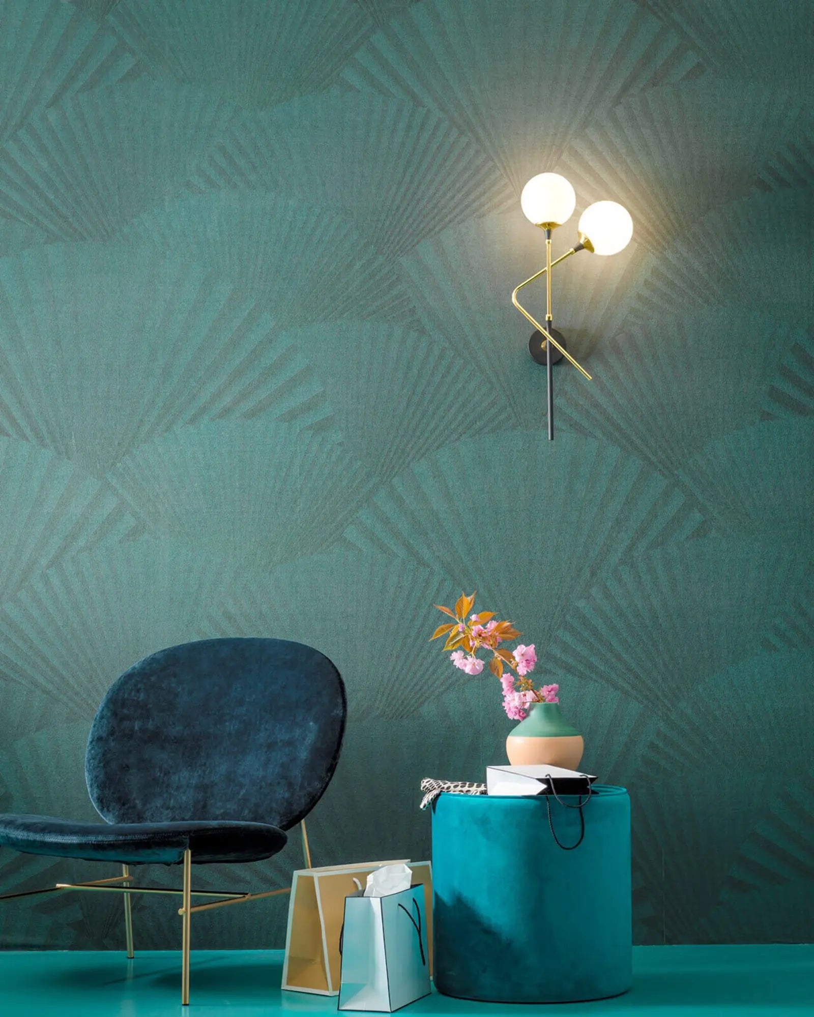 Galassia blown glass and brass wall light above lounge area