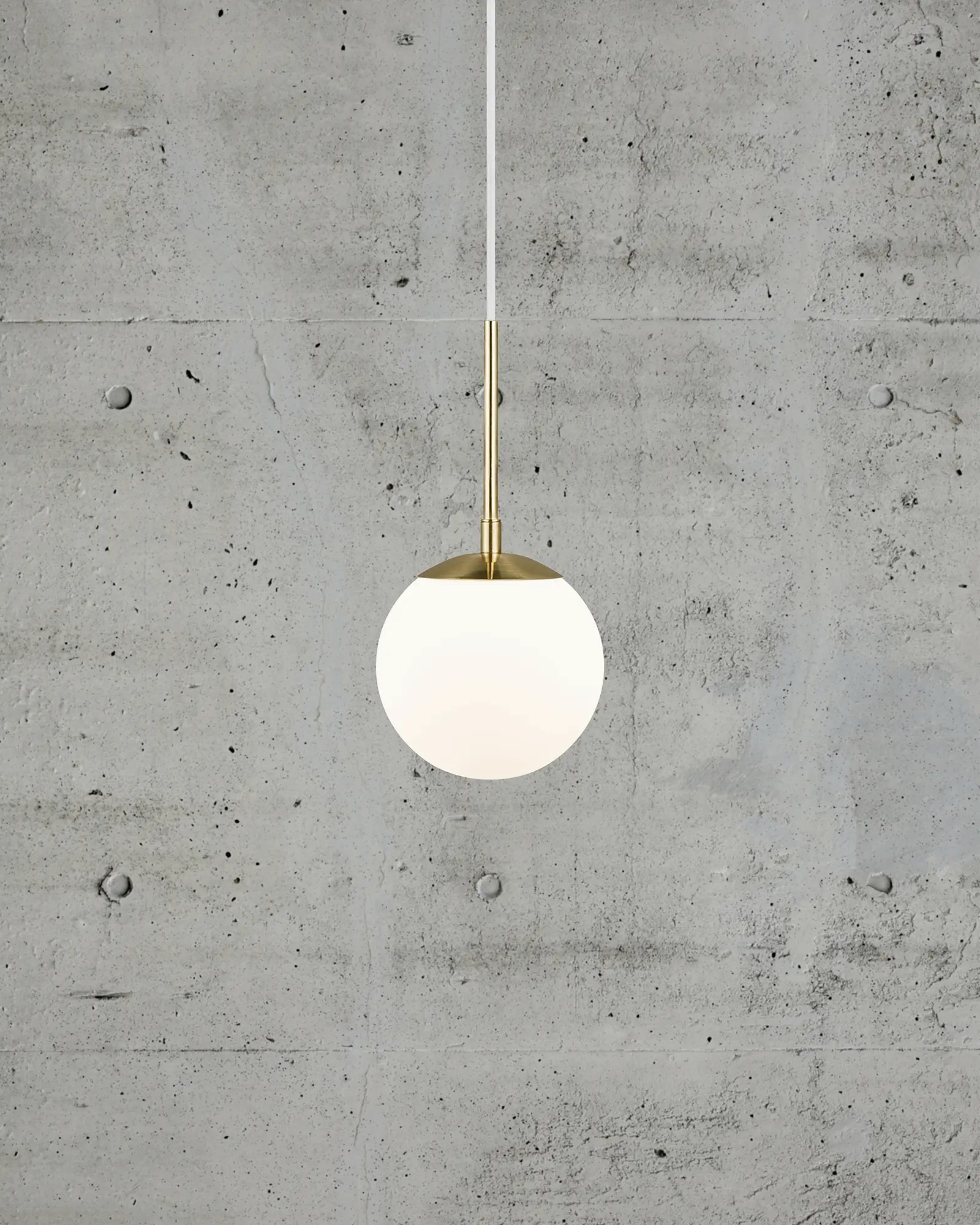 Grant orb pendant light in opal and brass 15