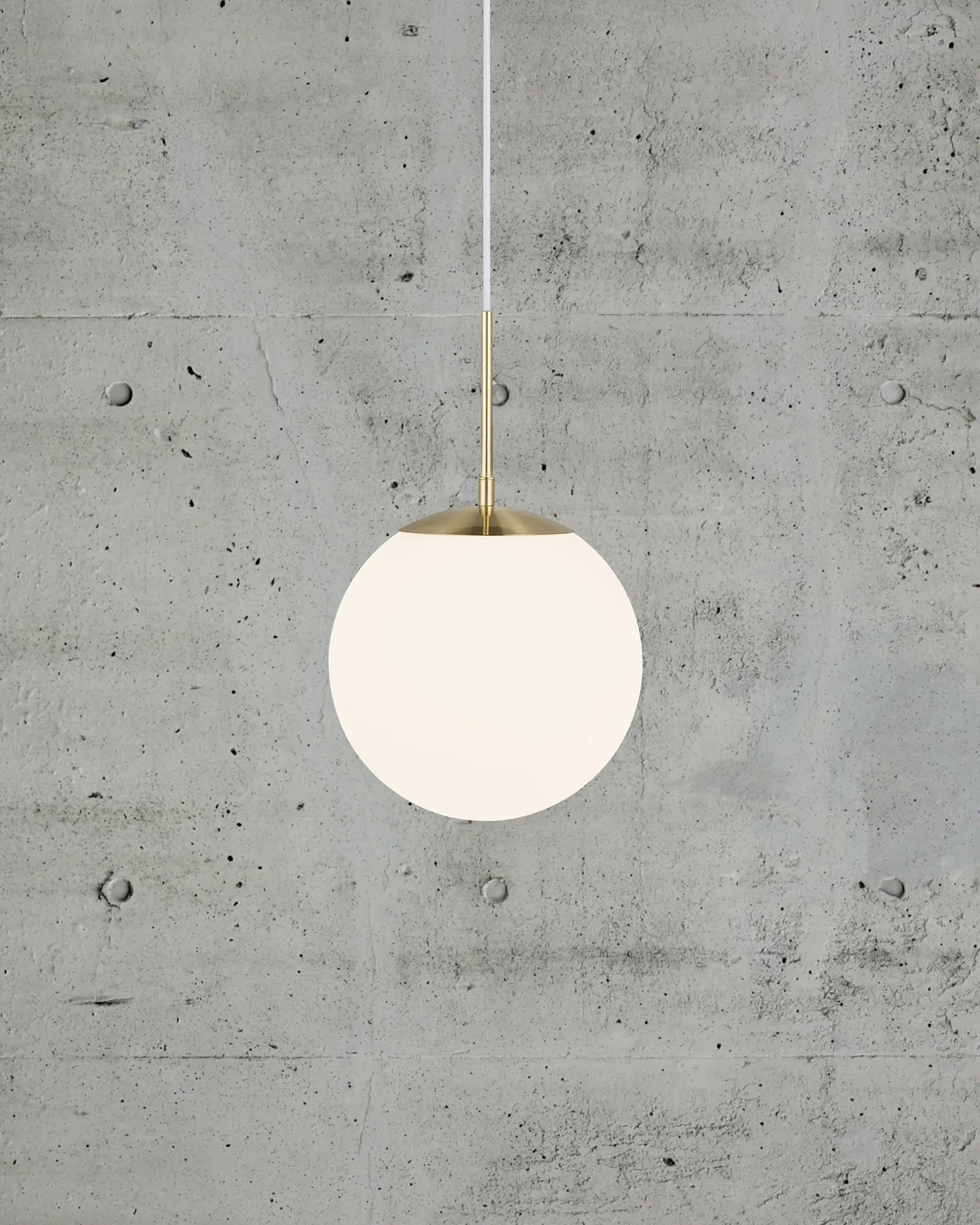 Grant orb pendant light in opal and brass 25