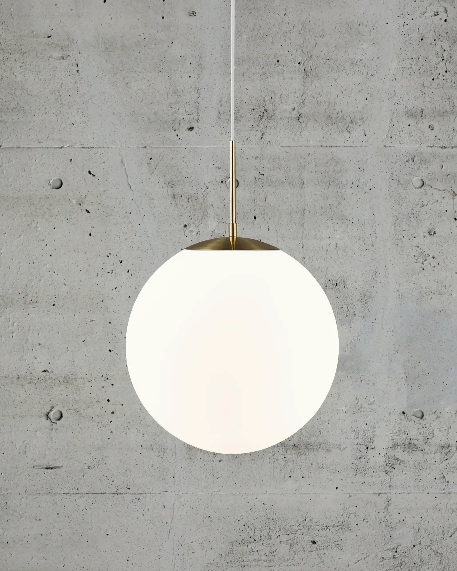 Grant orb pendant light in opal and brass 35